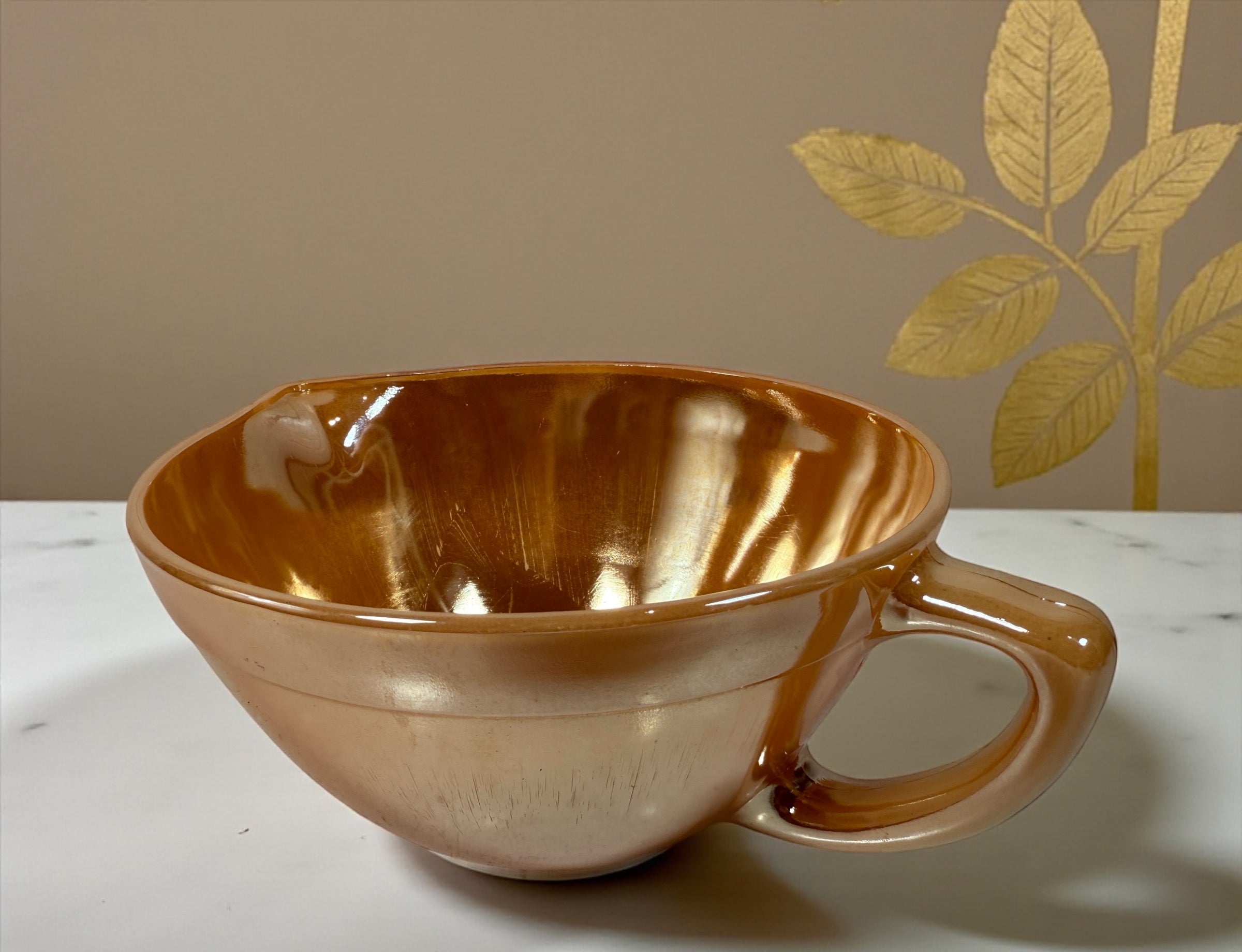 Vintage Fire-King Peach Luster mixing bowl with handle &amp; spout. Classic 1950s oven-proof milk glass collectible. Perfect for retro kitchens or display.