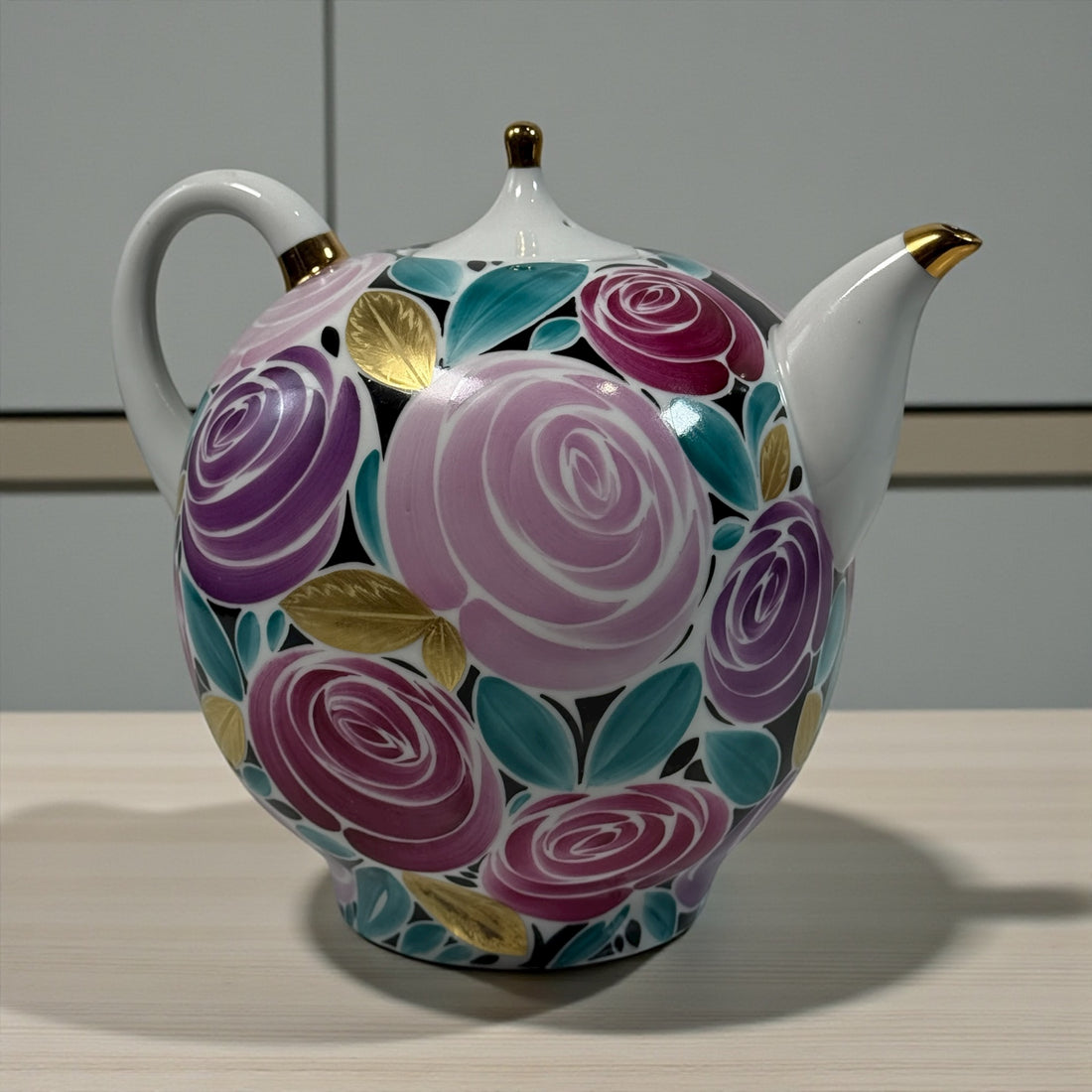 Vintage Lomonosov LFZ 1980s porcelain teapot with hand-painted roses and gold trim. Collectible Soviet-era floral design in excellent condition.