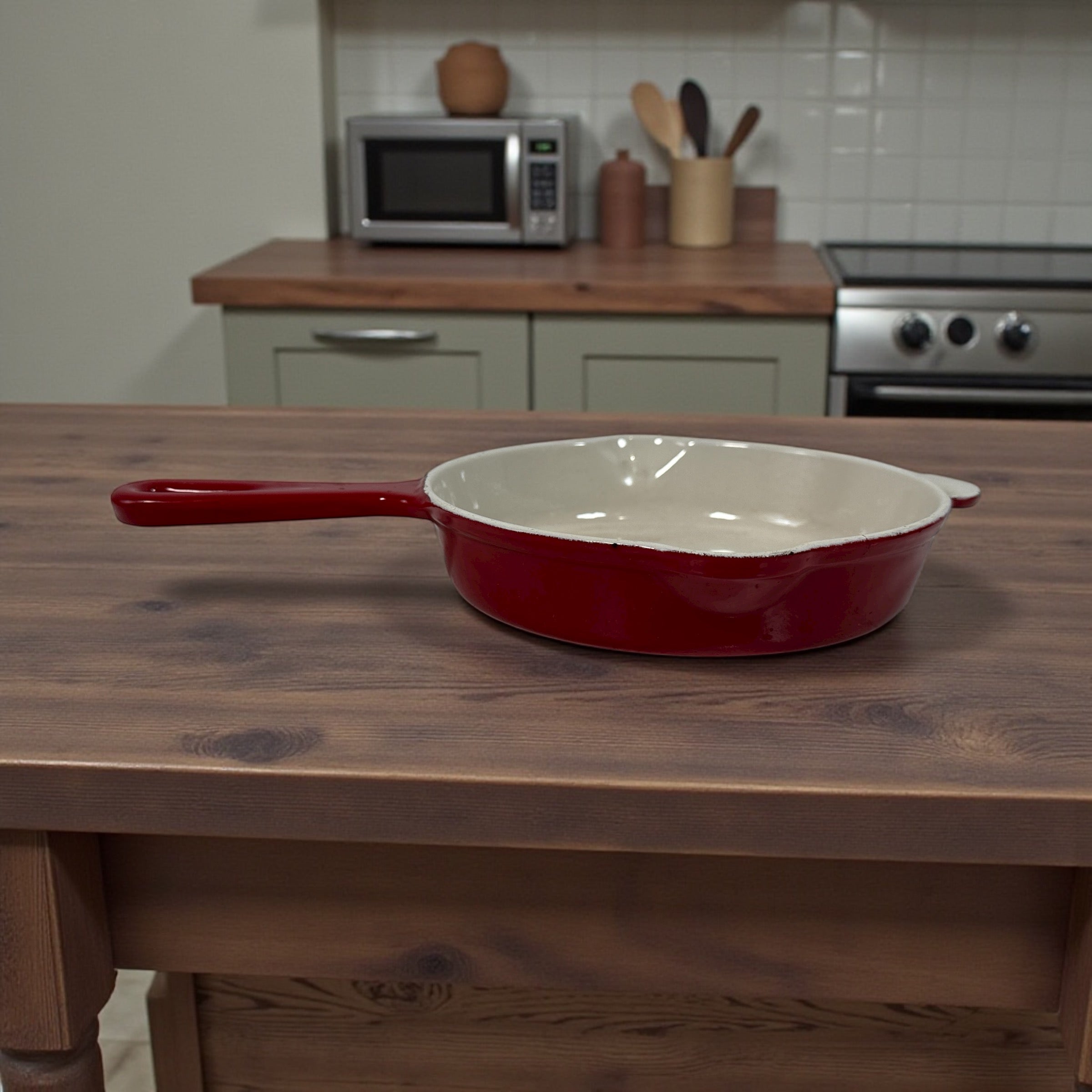 Vintage Cousances Le Creuset #16 enameled cast iron skillet in Flame red. French-made, functional with vintage wear. Great for cooking or display.