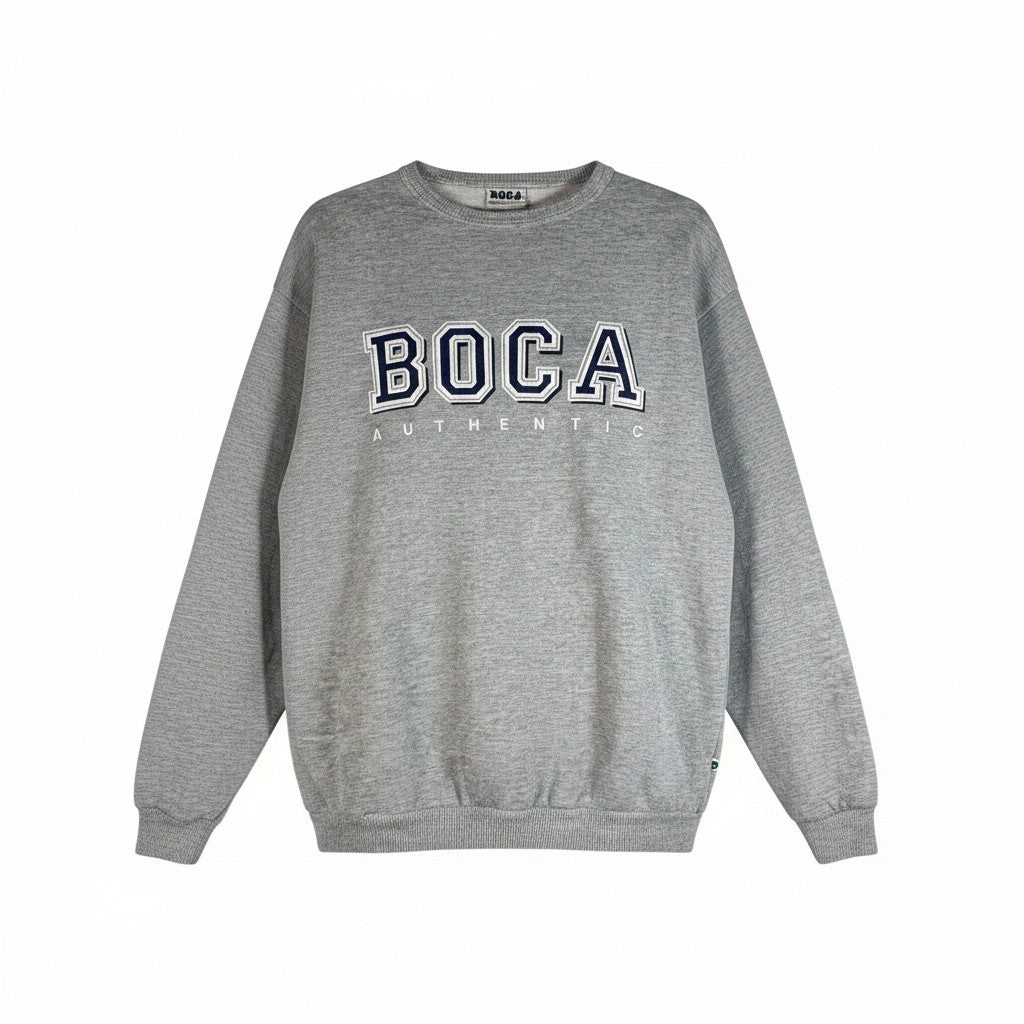 Vintage BOCA Canadian-made crewneck sweatshirt in grey with varsity logo styling and relaxed 90s athletic wear fit.