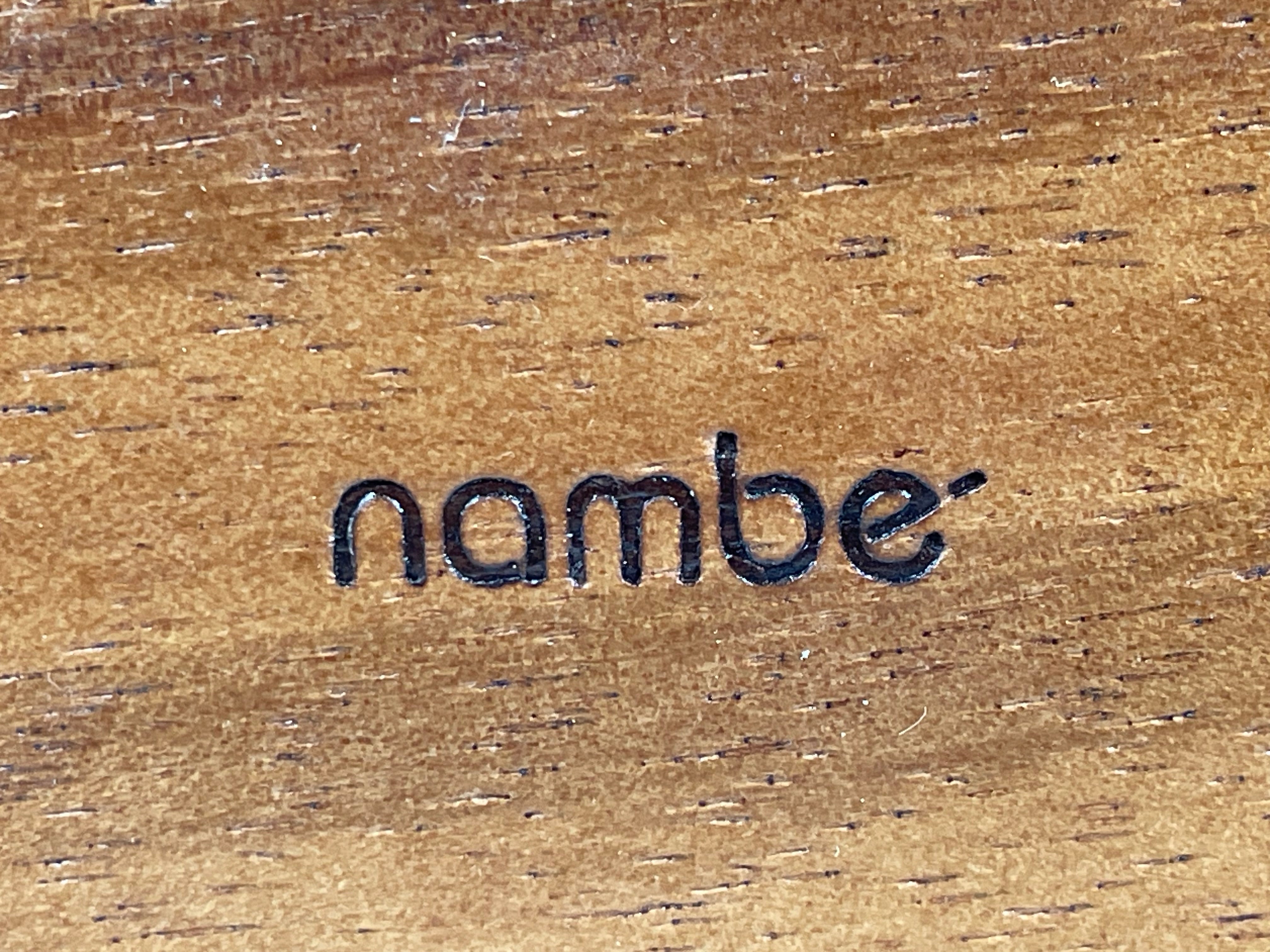 Nambé Napkin Holder – Sculptural Alloy & Wood Design