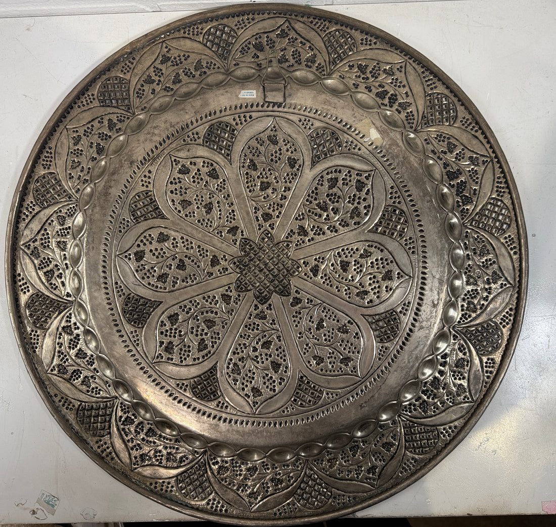 Vintage 24” solid brass tray made in India with hand-chased floral design and pierced edging. Ideal for décor or table use. Classic mid-century export piece.