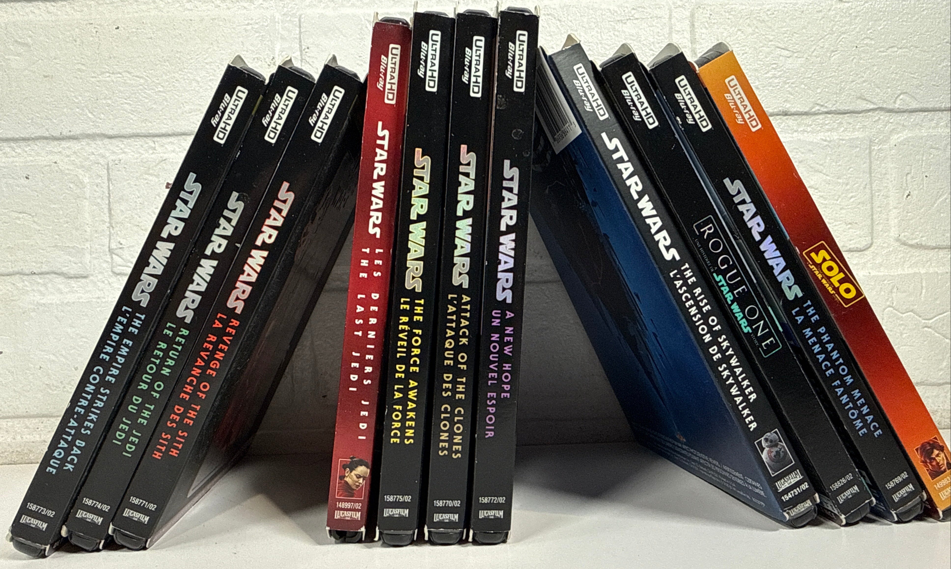 Complete 11-movie Star Wars 4K Ultra HD Blu-ray collection with original slipcovers, including Rogue One and Solo. Official Disney releases in excellent pre-owned condition.