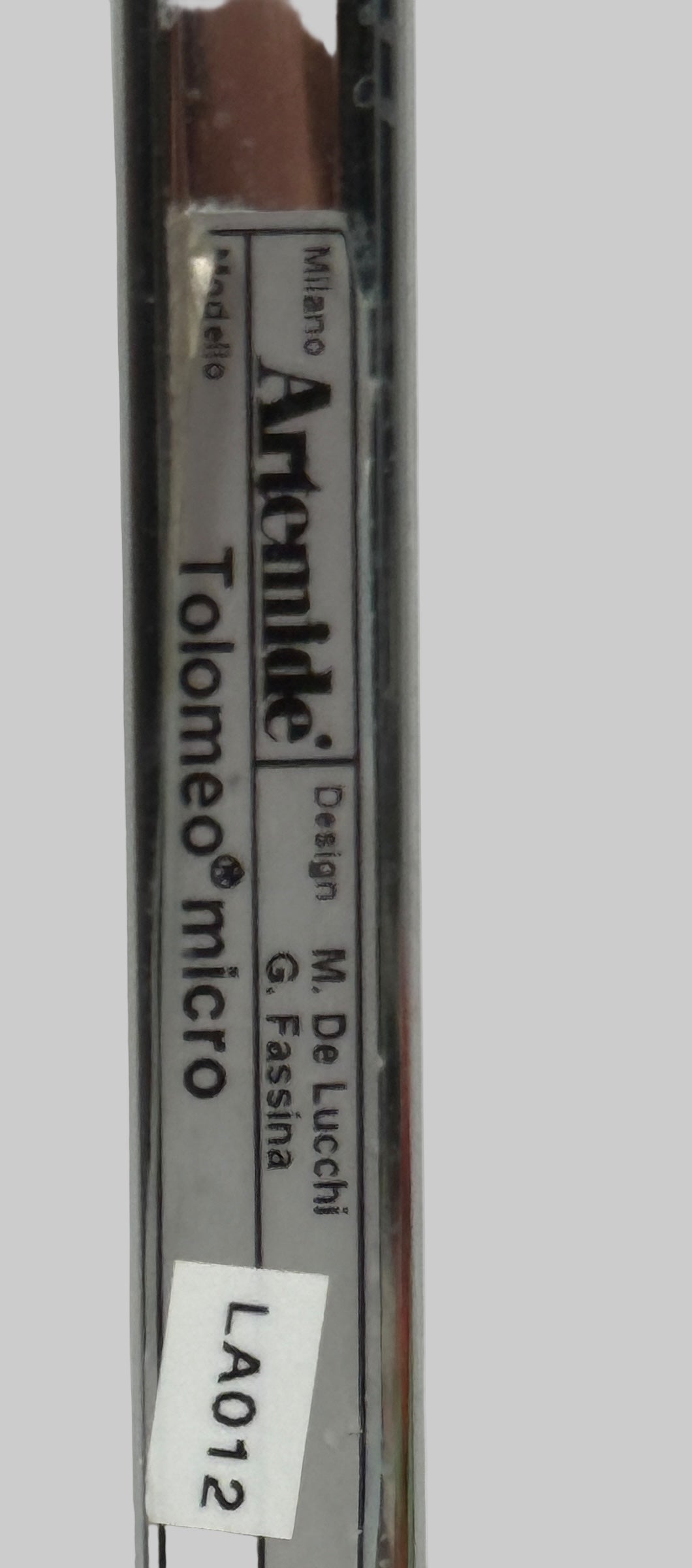 Tolomeo micro pen with Artemide branding on a white background