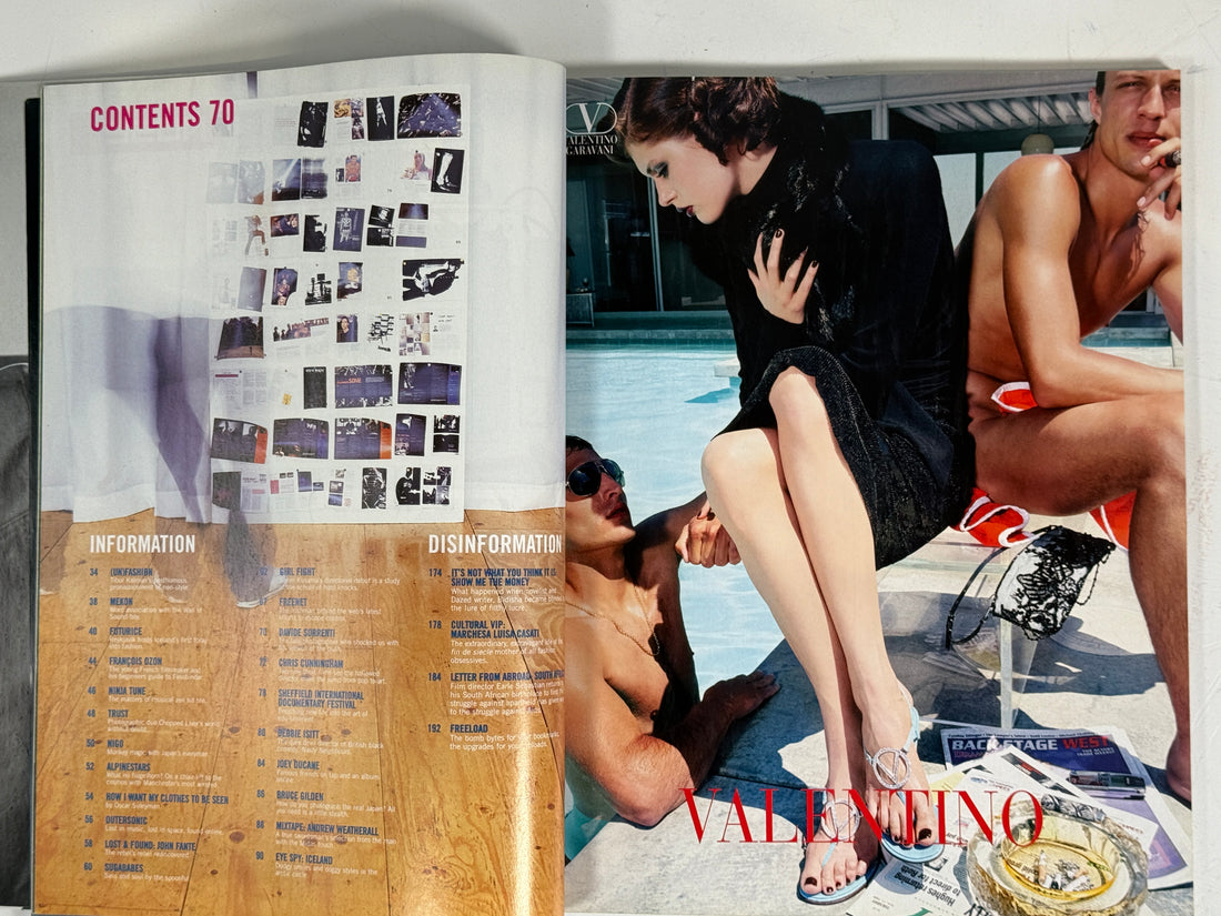 Magazine with a model posing by a pool and a table with a 'Valentino' product.