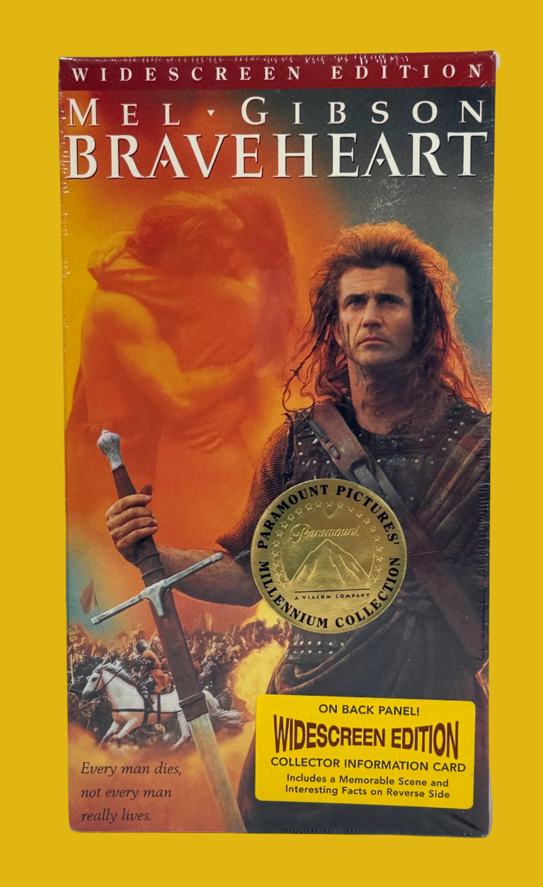 VHS cover of 'Braveheart' with Mel Gibson holding a sword against a brick wall.