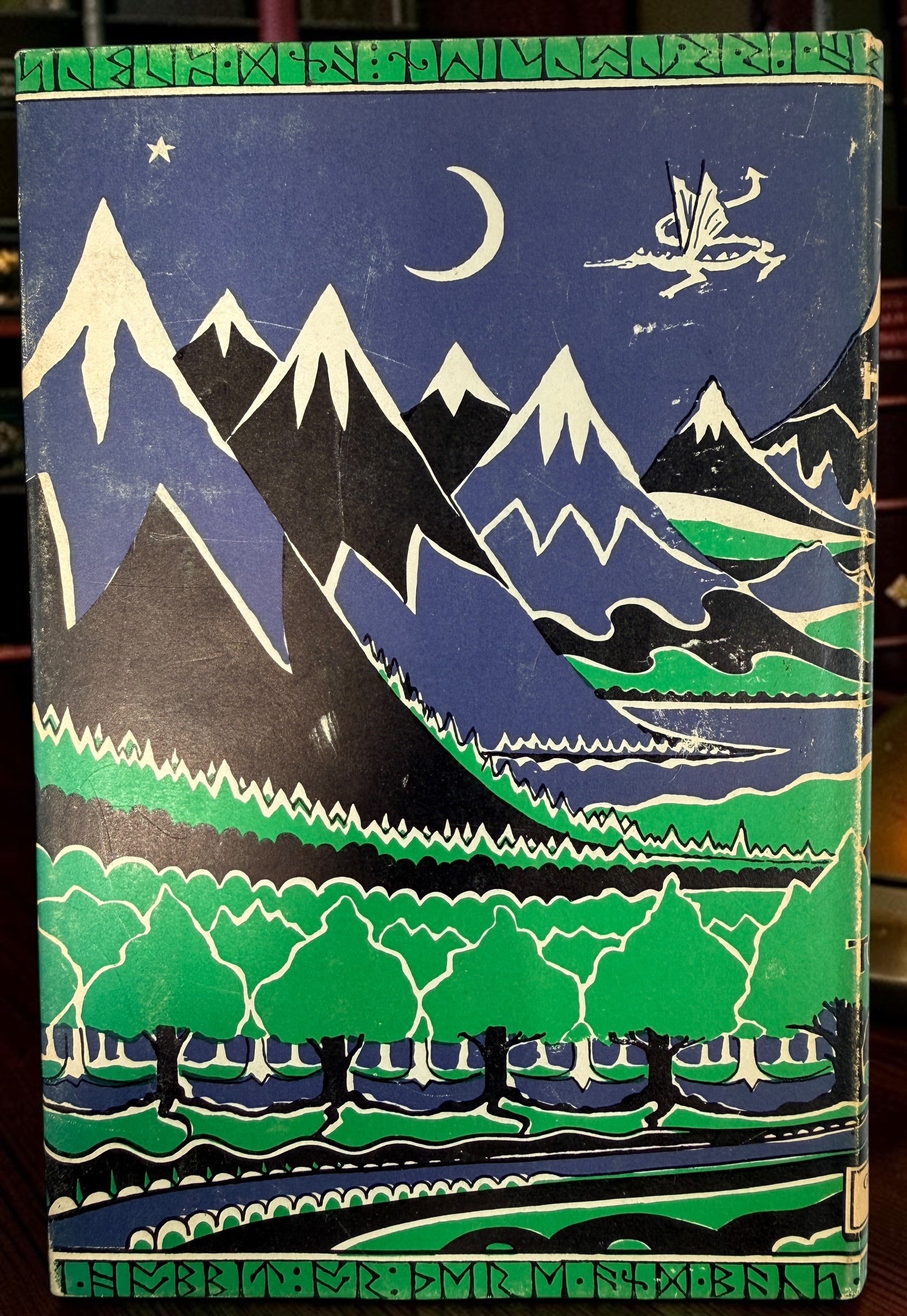 Collectible 1975 UK hardcover of Tolkien’s The Hobbit, Third Edition, Tenth Impression, with original illustrated dust jacket and endpaper maps.