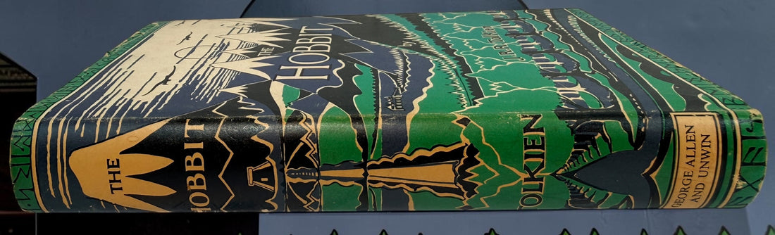 Collectible 1975 UK hardcover of Tolkien’s The Hobbit, Third Edition, Tenth Impression, with original illustrated dust jacket and endpaper maps.
