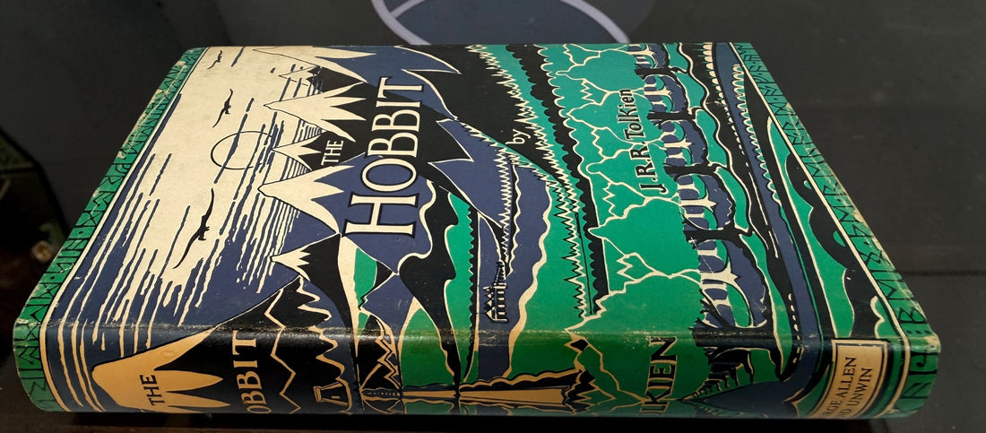 Collectible 1975 UK hardcover of Tolkien’s The Hobbit, Third Edition, Tenth Impression, with original illustrated dust jacket and endpaper maps.