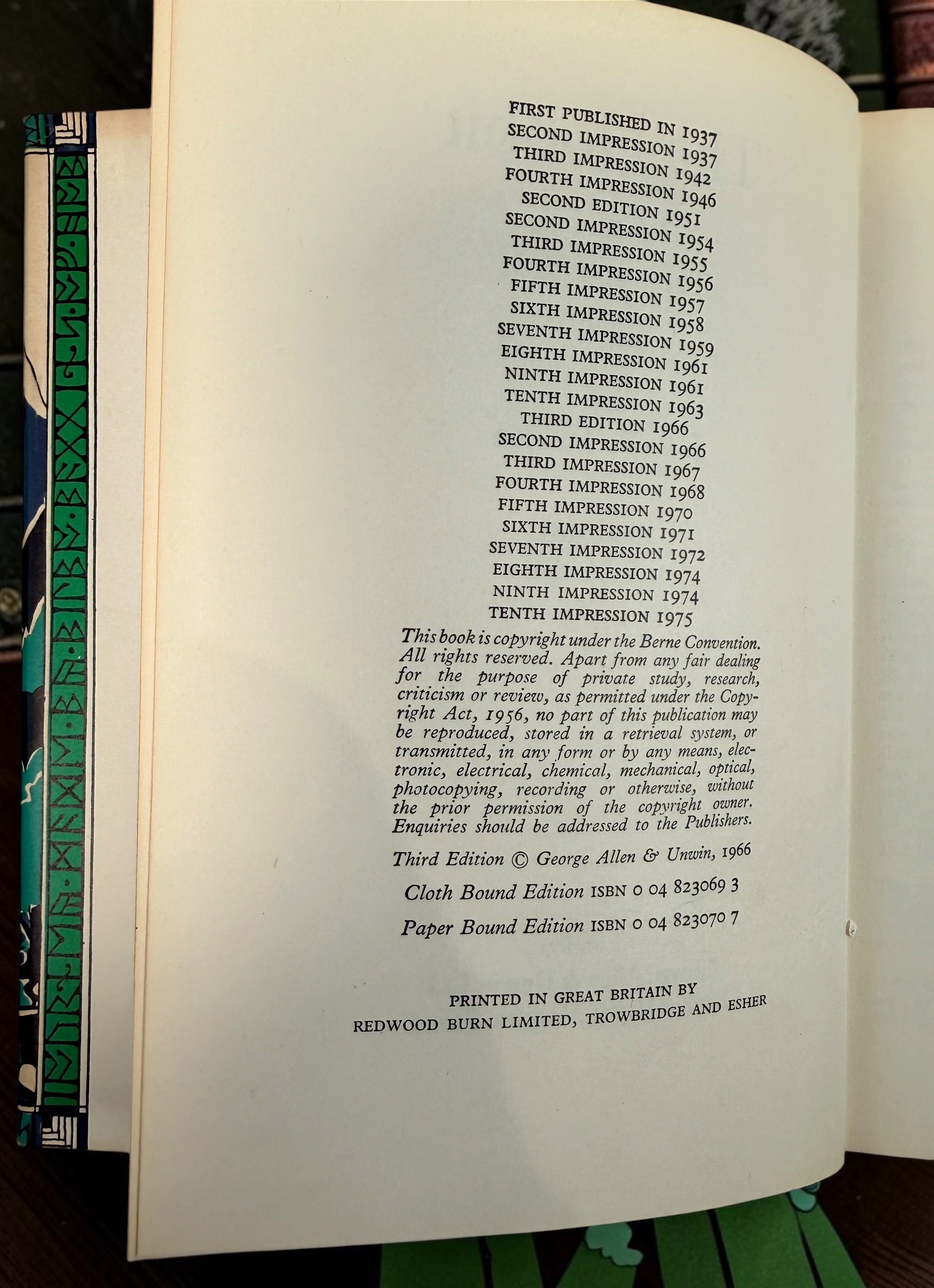 Collectible 1975 UK hardcover of Tolkien’s The Hobbit, Third Edition, Tenth Impression, with original illustrated dust jacket and endpaper maps.