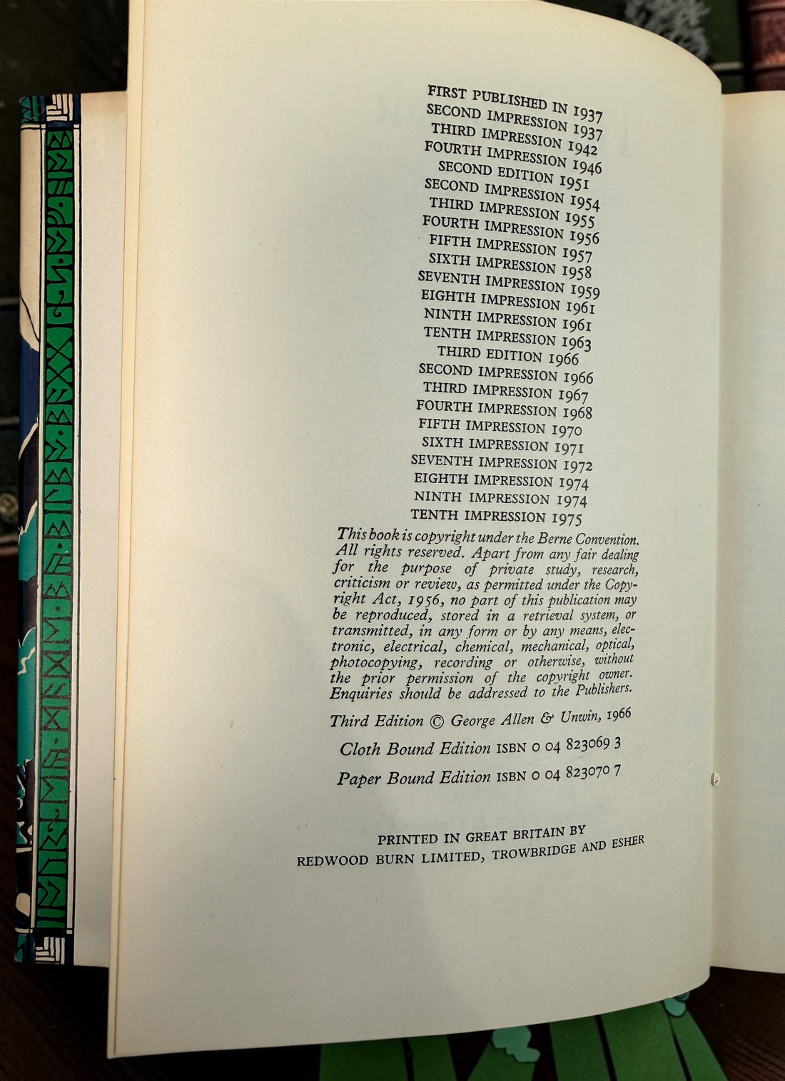 Collectible 1975 UK hardcover of Tolkien’s The Hobbit, Third Edition, Tenth Impression, with original illustrated dust jacket and endpaper maps.