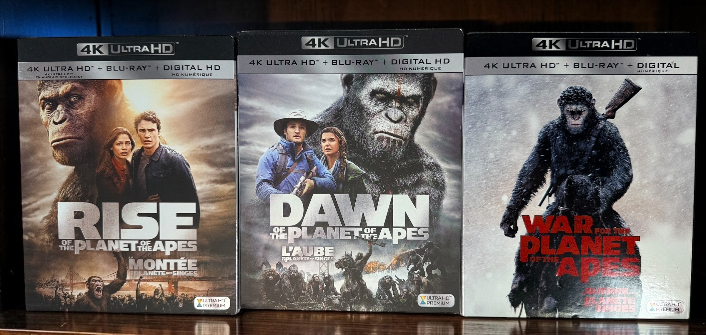 Planet of the Apes trilogy with Rise, Dawn and War on 4K UHD and Blu-ray. Complete six-disc bilingual set with original slipcovers.