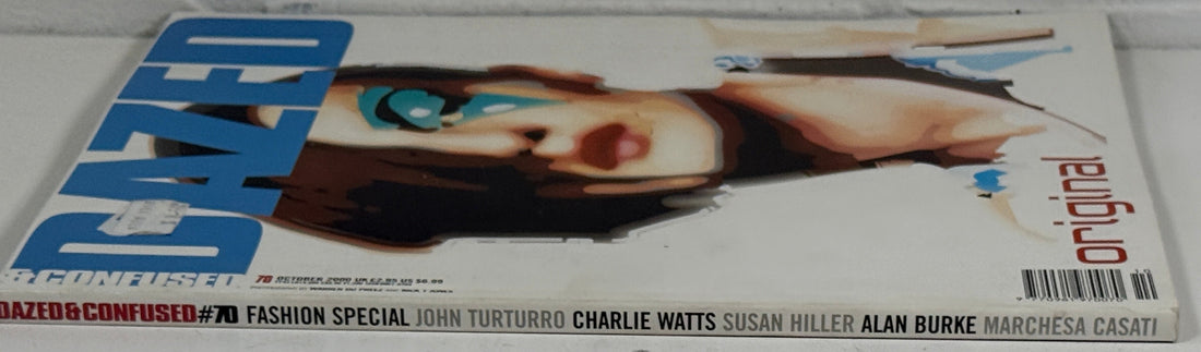 Magazine cover with a model's face on a white background