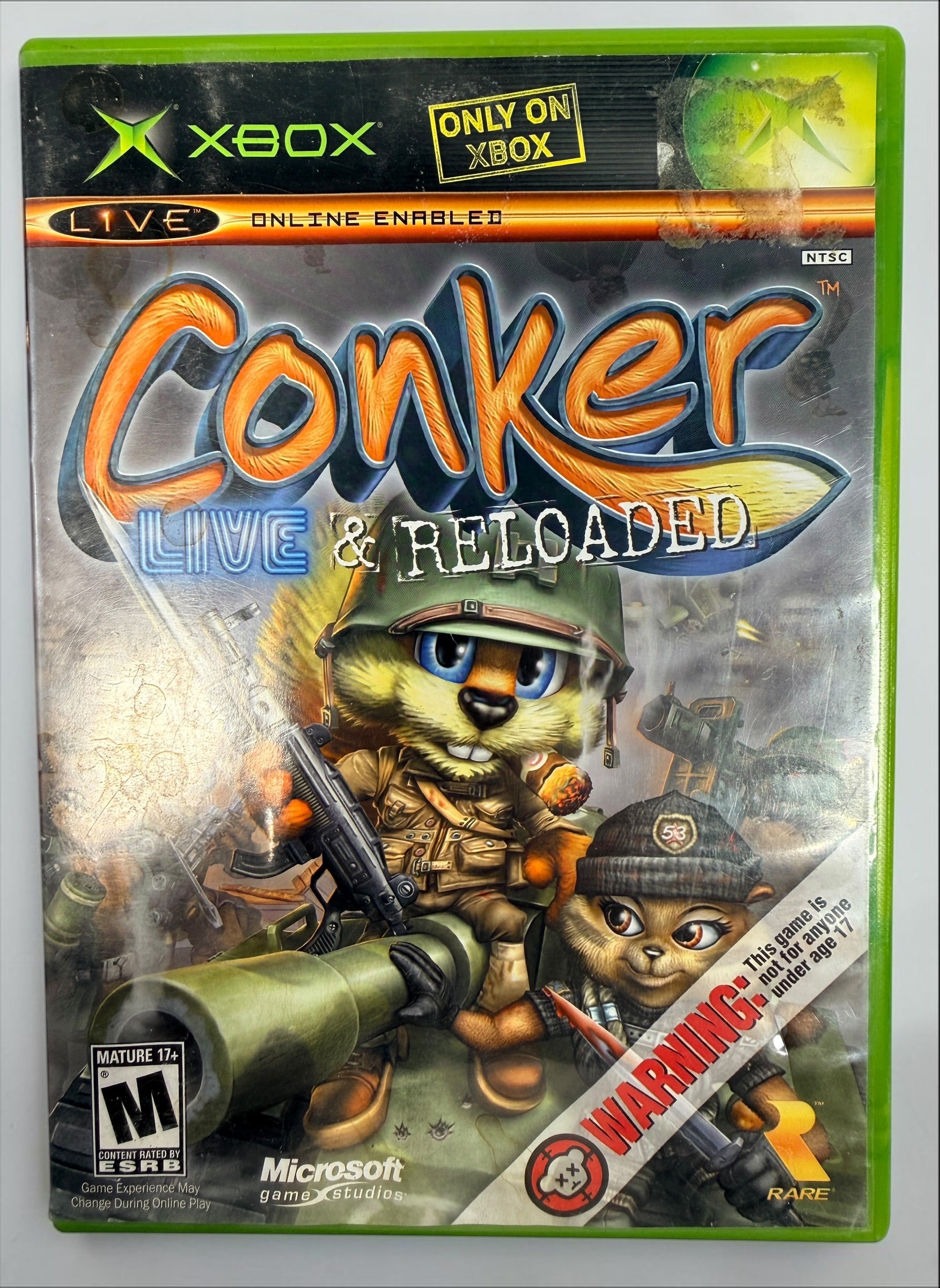 Conker: Live &amp; Reloaded for original Xbox, 2005 NTSC edition with disc, case and manual. Pre-owned, visibly worn and untested.