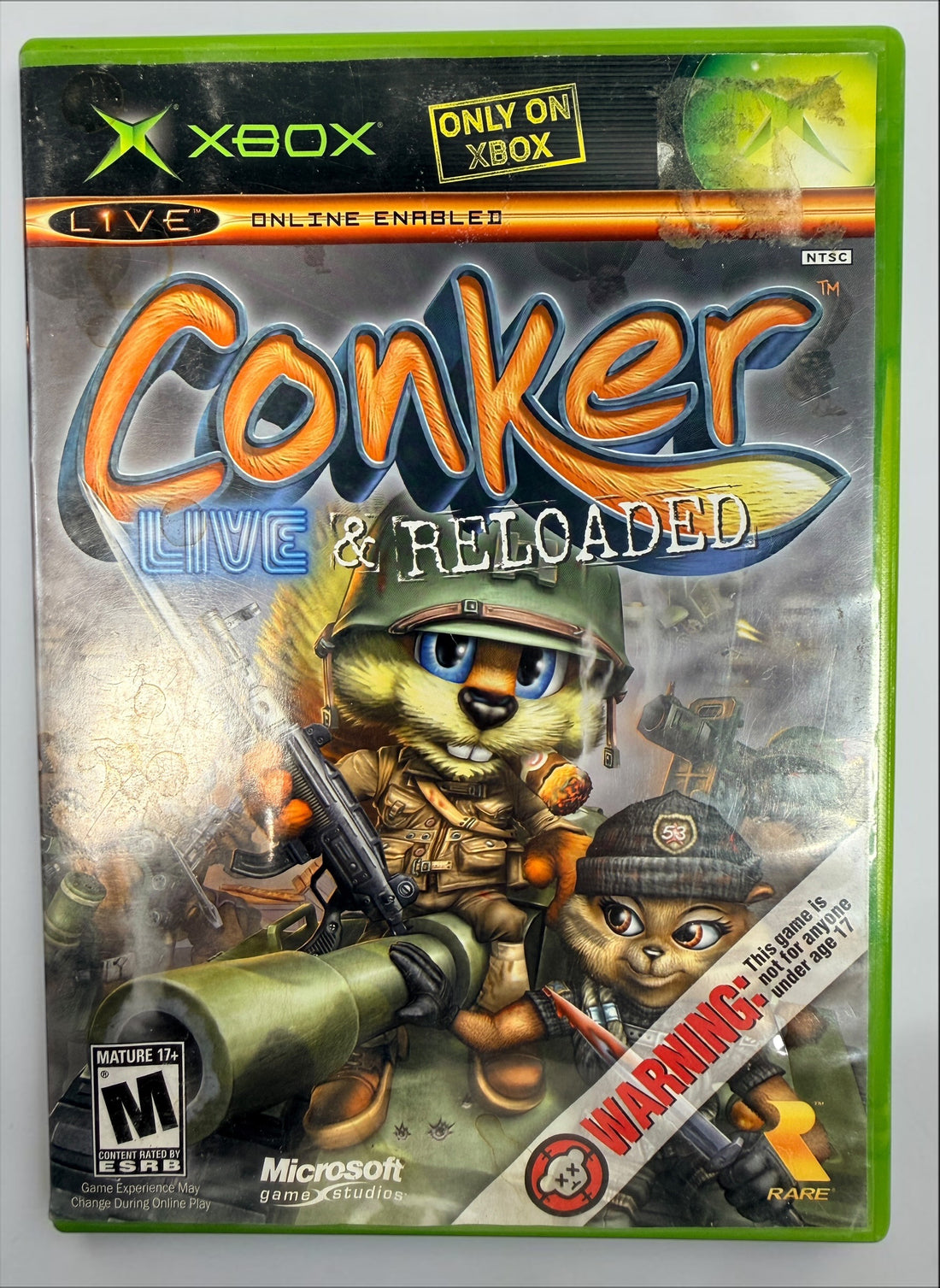 Conker: Live &amp; Reloaded for original Xbox, 2005 NTSC edition with disc, case and manual. Pre-owned, visibly worn and untested.