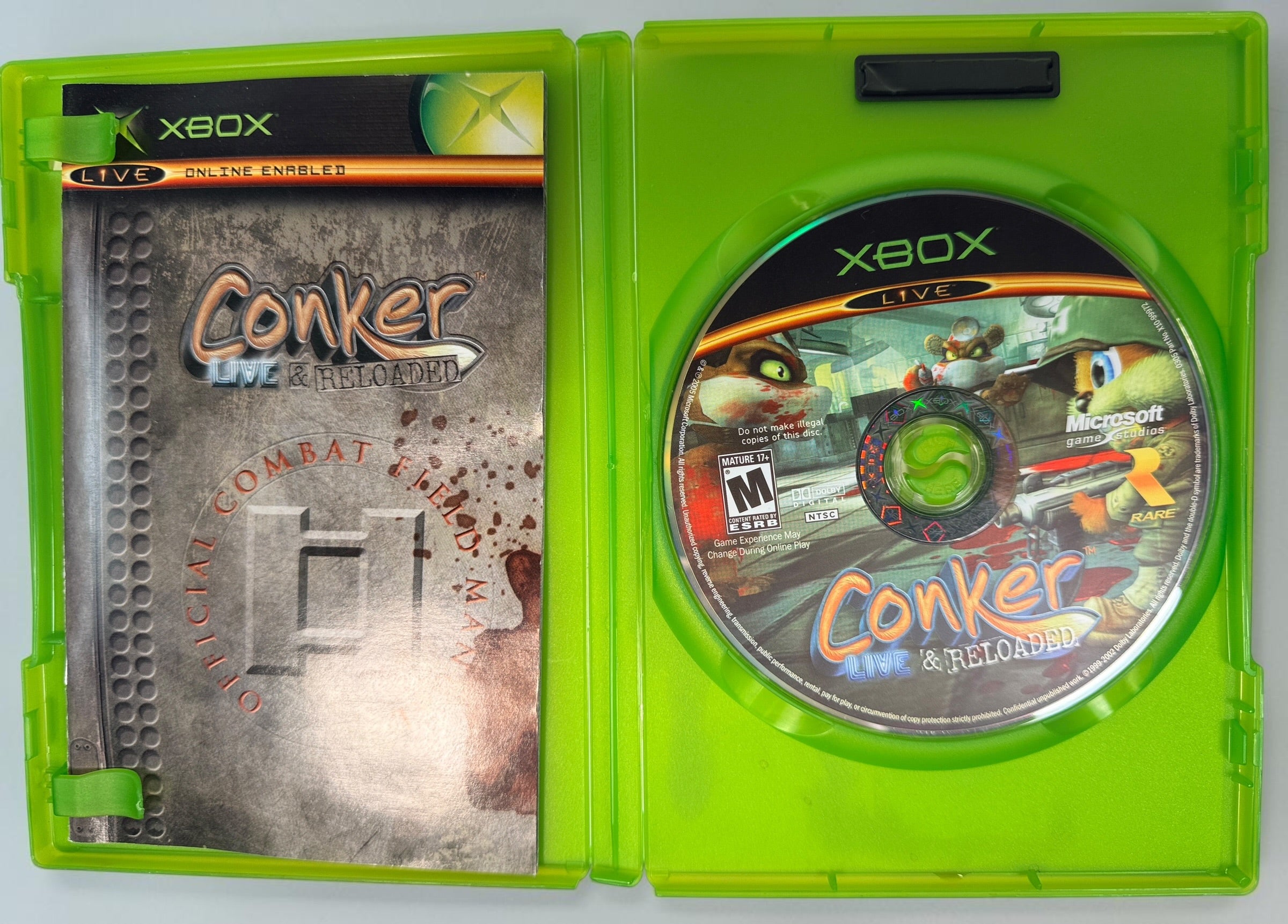 Conker: Live &amp; Reloaded for original Xbox, 2005 NTSC edition with disc, case and manual. Pre-owned, visibly worn and untested.