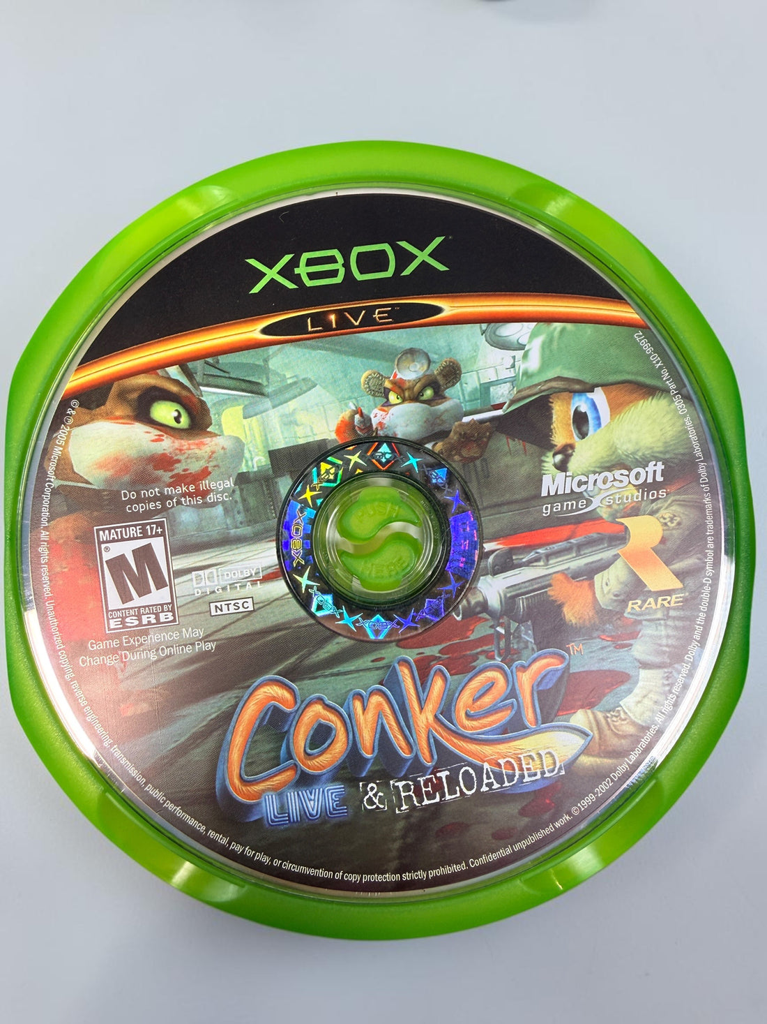Conker: Live &amp; Reloaded for original Xbox, 2005 NTSC edition with disc, case and manual. Pre-owned, visibly worn and untested.