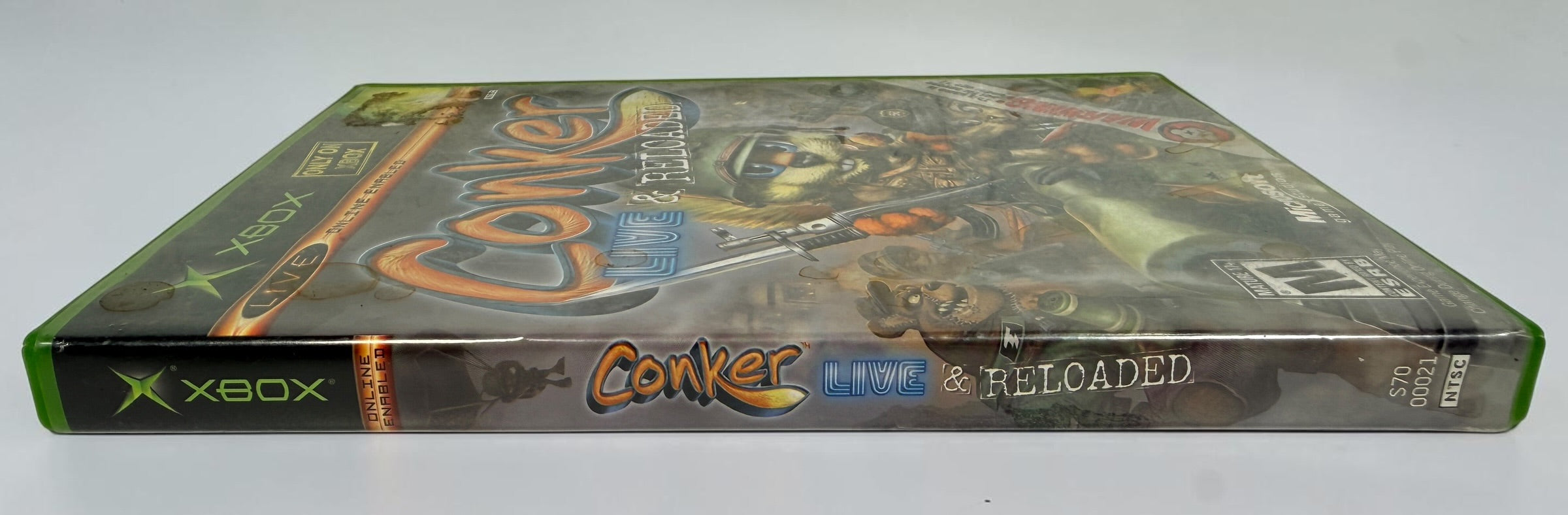 Conker: Live &amp; Reloaded for original Xbox, 2005 NTSC edition with disc, case and manual. Pre-owned, visibly worn and untested.