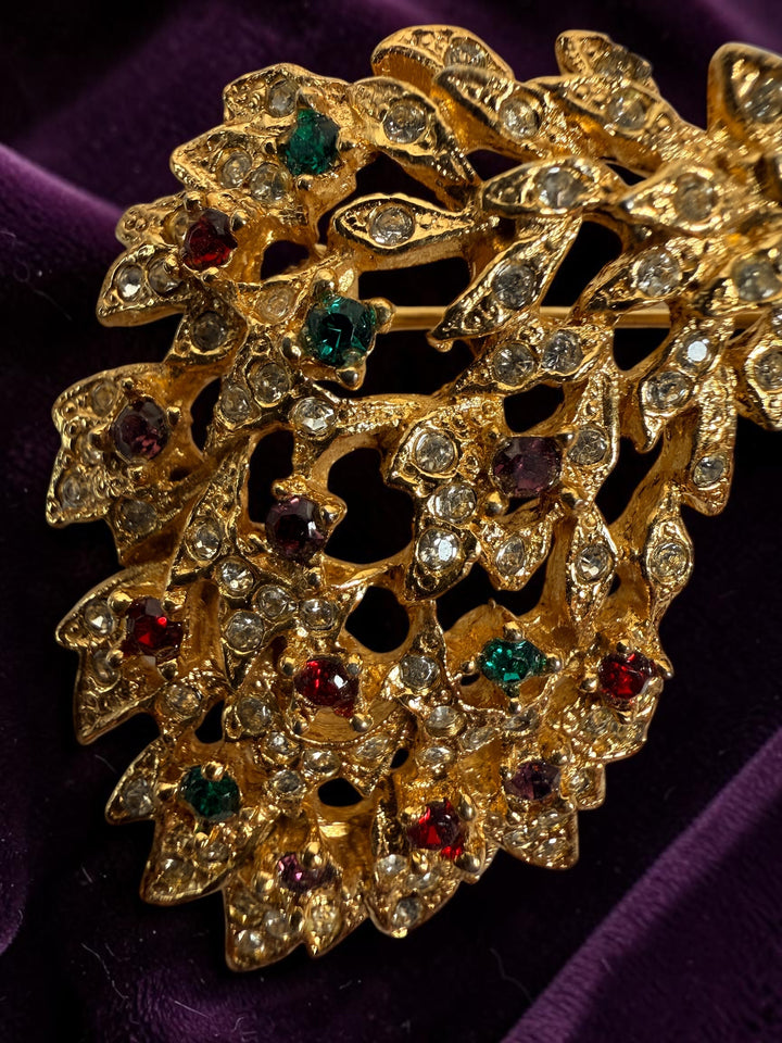 Vintage signed Sphinx 2046 peacock brooch with purple enamel, gold-tone openwork and colourful rhinestones. British costume jewellery.