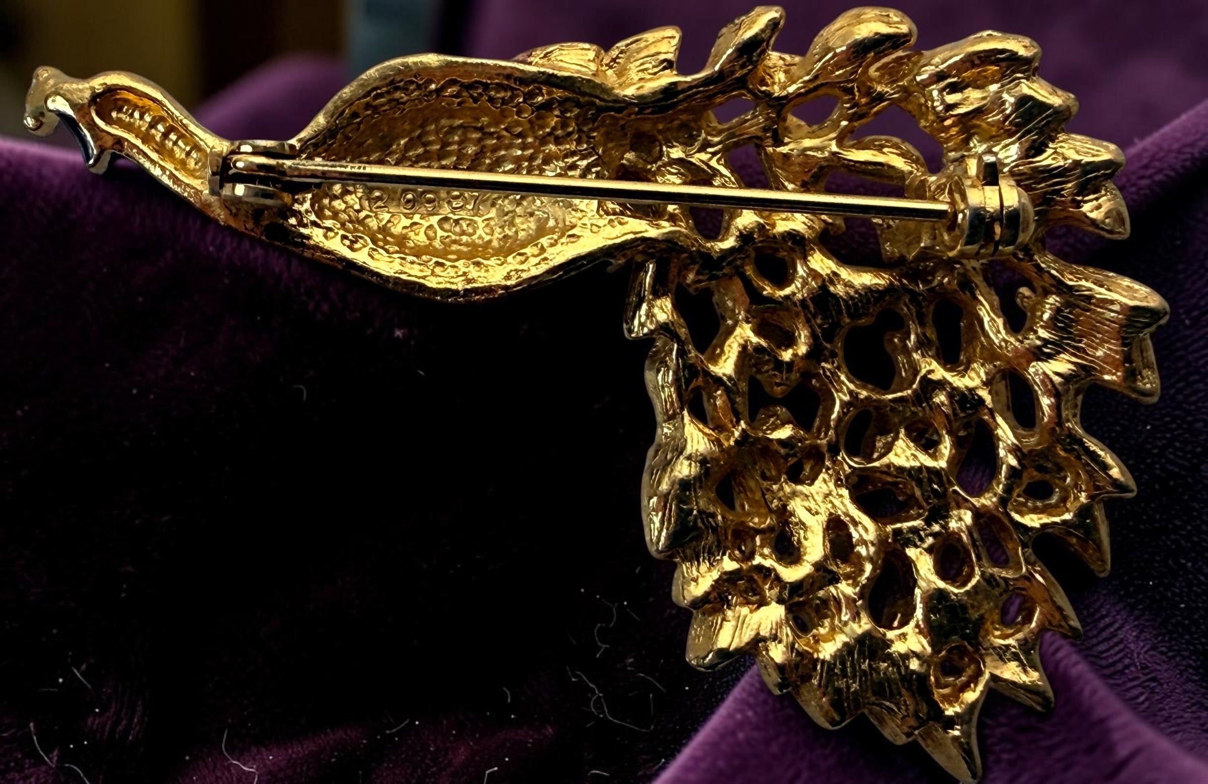 Vintage signed Sphinx 2046 peacock brooch with purple enamel, gold-tone openwork and colourful rhinestones. British costume jewellery.