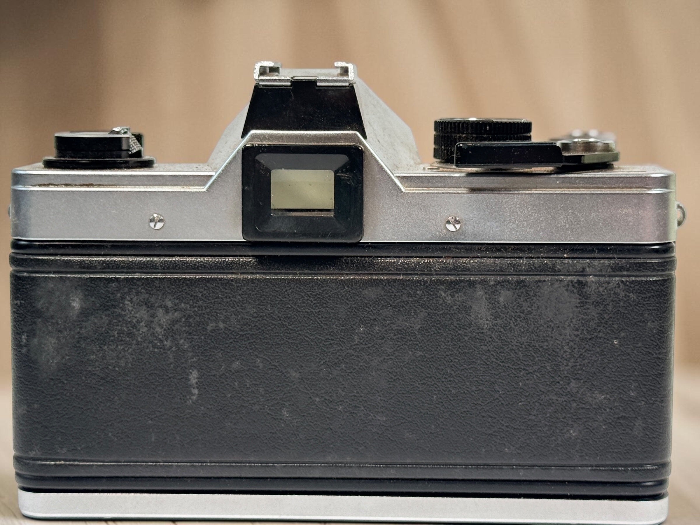 Vintage Praktica MTL 5 East German 35mm SLR with Carl Zeiss Jena Biotar 58mm f/2 M42 lens, cases and strap. Untested and sold as-is.