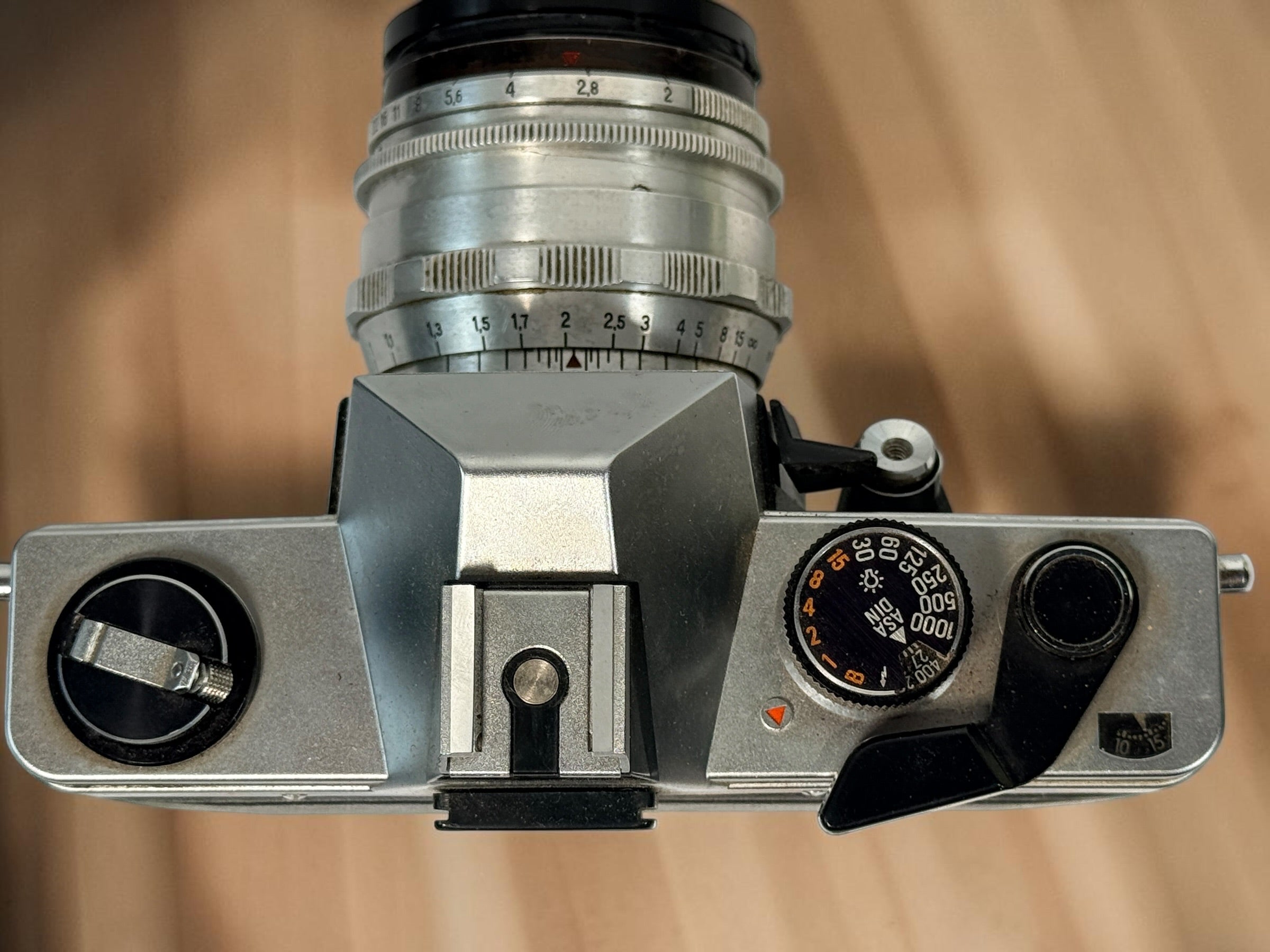 Vintage Praktica MTL 5 East German 35mm SLR with Carl Zeiss Jena Biotar 58mm f/2 M42 lens, cases and strap. Untested and sold as-is.
