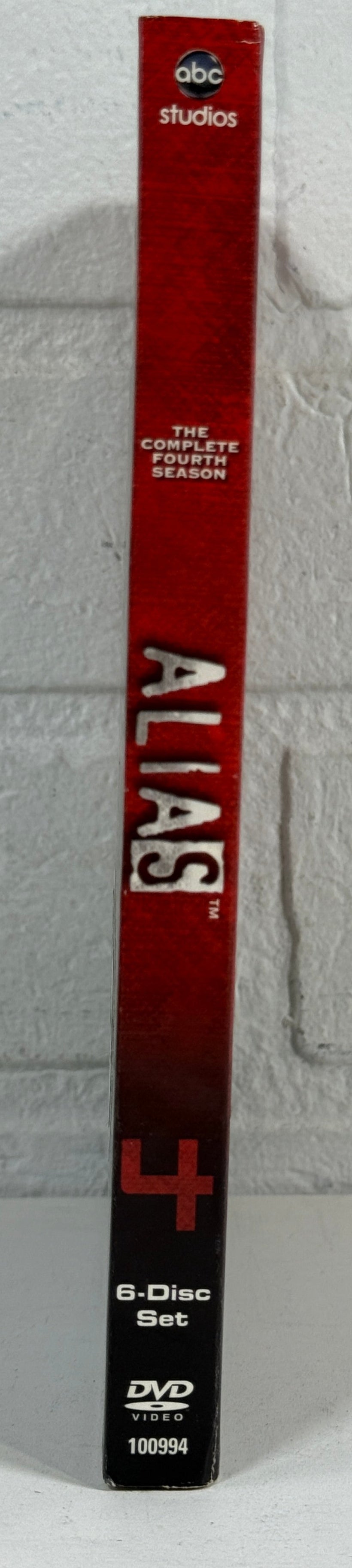 DVD case for 'Alias' on a textured white background