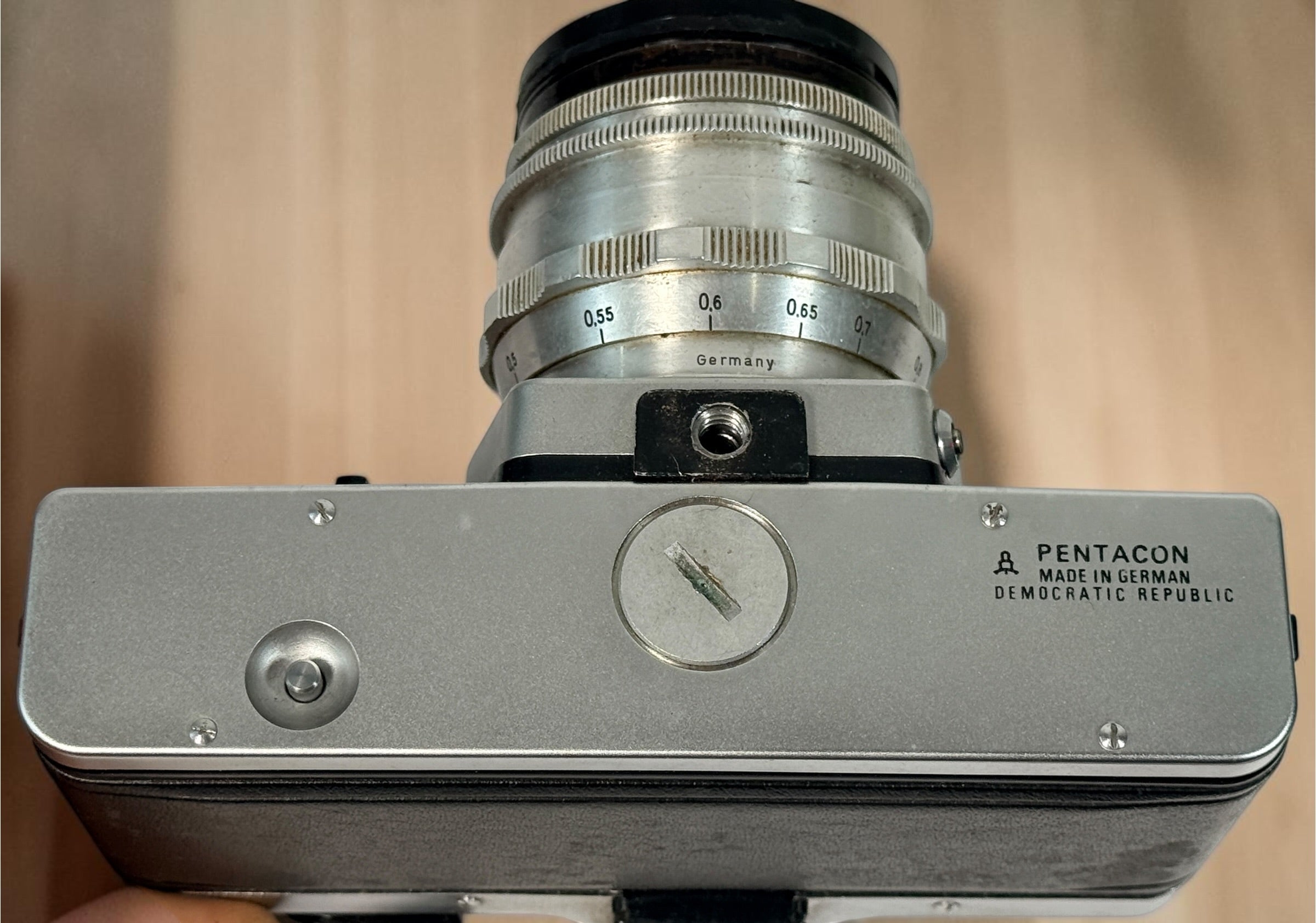 Vintage Praktica MTL 5 East German 35mm SLR with Carl Zeiss Jena Biotar 58mm f/2 M42 lens, cases and strap. Untested and sold as-is.