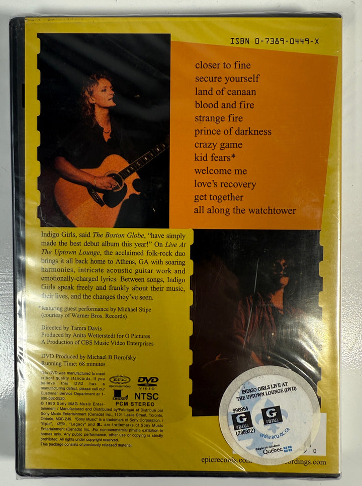 DVD case with a person playing guitar on a yellow background