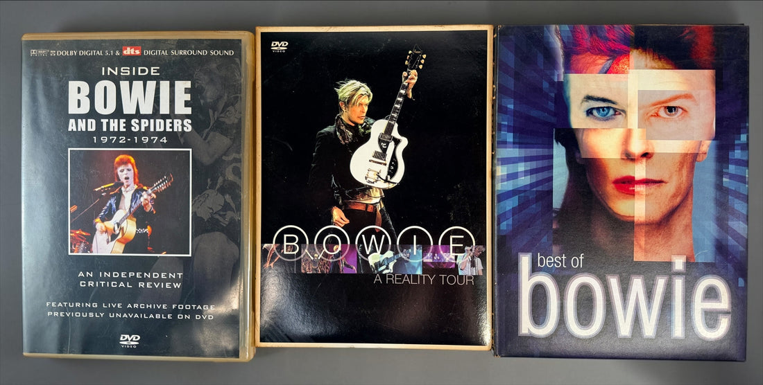 David Bowie 4-disc DVD lot with Best of Bowie, A Reality Tour and Inside Bowie and the Spiders 1972–1974. Pre-owned collector set