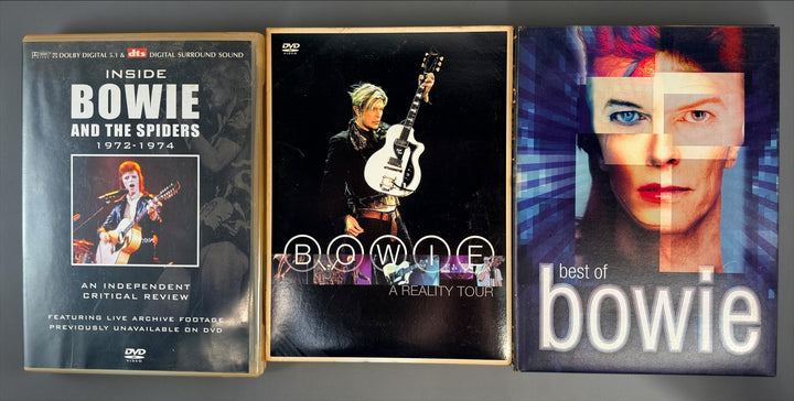 David Bowie 4-disc DVD lot with Best of Bowie, A Reality Tour and Inside Bowie and the Spiders 1972–1974. Pre-owned collector set