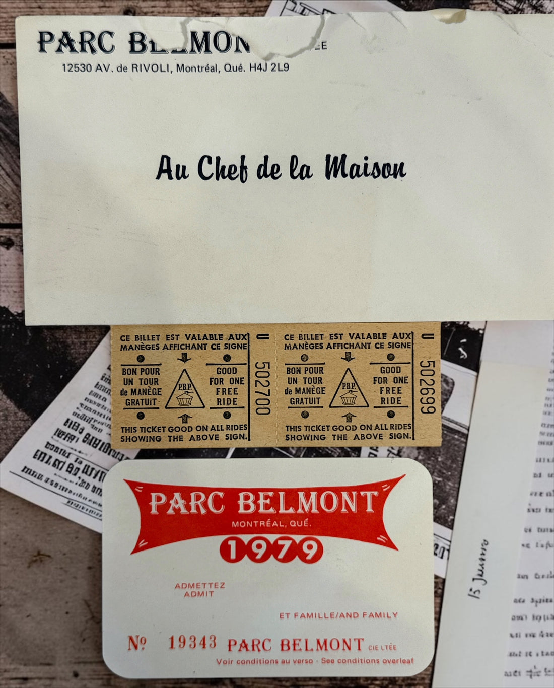 Original 1979 Parc Belmont Montreal family pass with two unused ride tickets and presentation envelope. Collectible Montreal amusement-park ephemera.