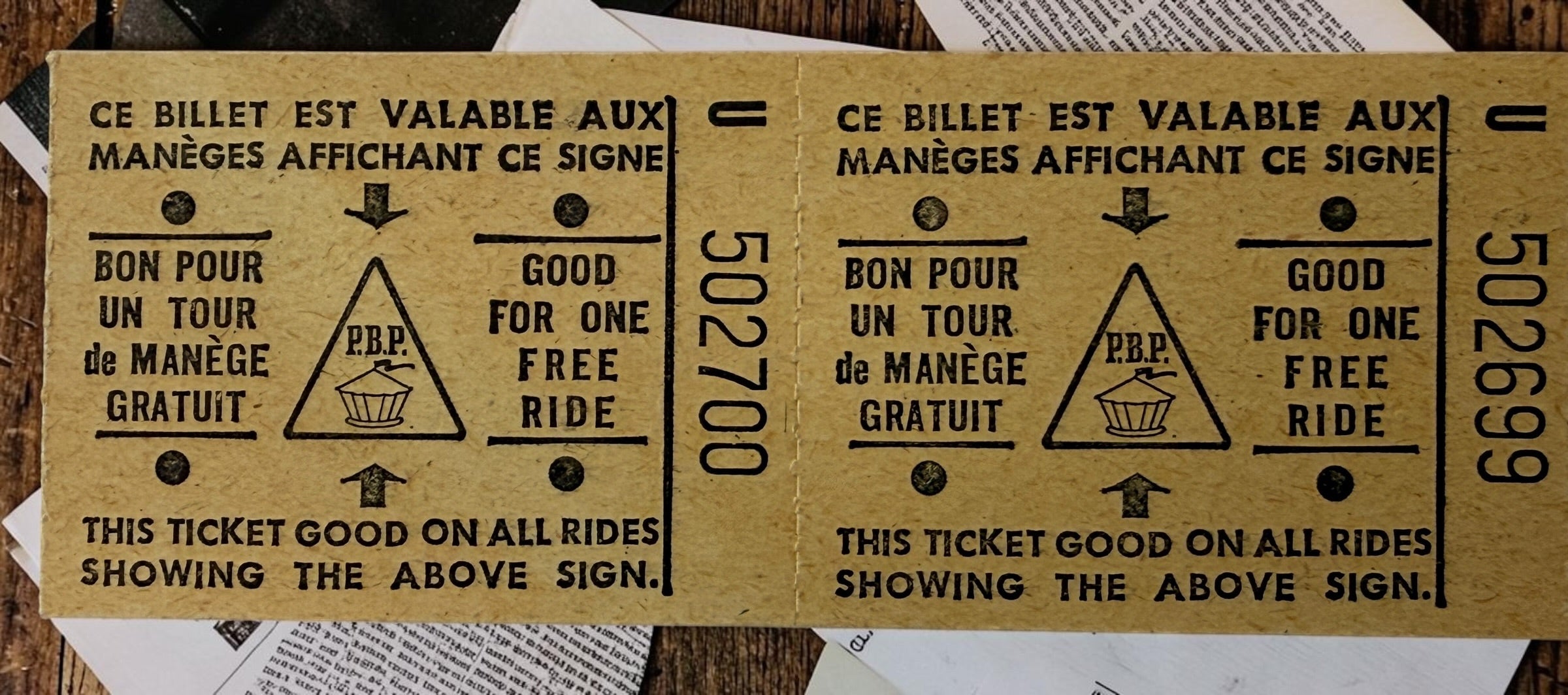 Original 1979 Parc Belmont Montreal family pass with two unused ride tickets and presentation envelope. Collectible Montreal amusement-park ephemera.