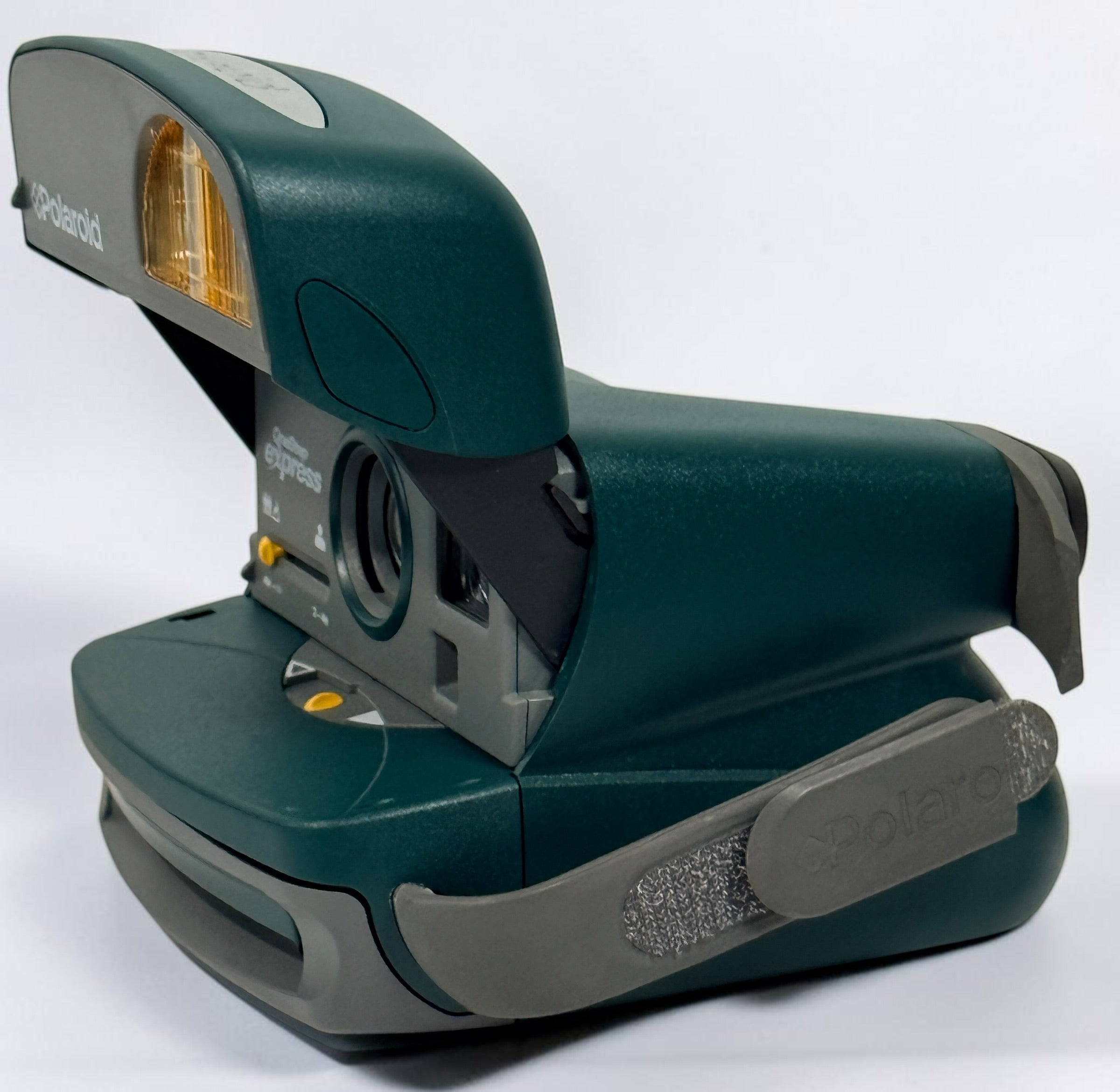 Vintage green Polaroid OneStep Express instant camera for 600 film with built-in flash and close-up mode. Untested and sold as-is.