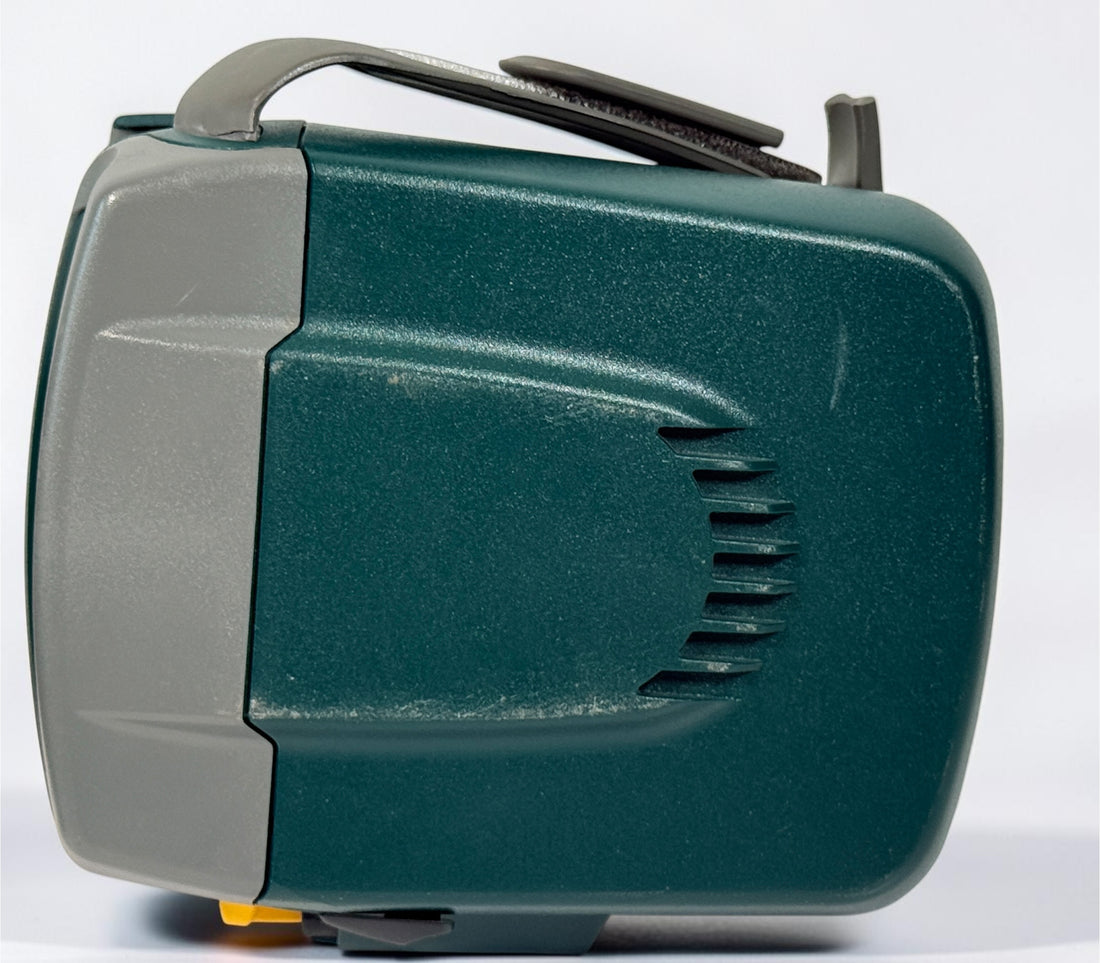 Vintage green Polaroid OneStep Express instant camera for 600 film with built-in flash and close-up mode. Untested and sold as-is.