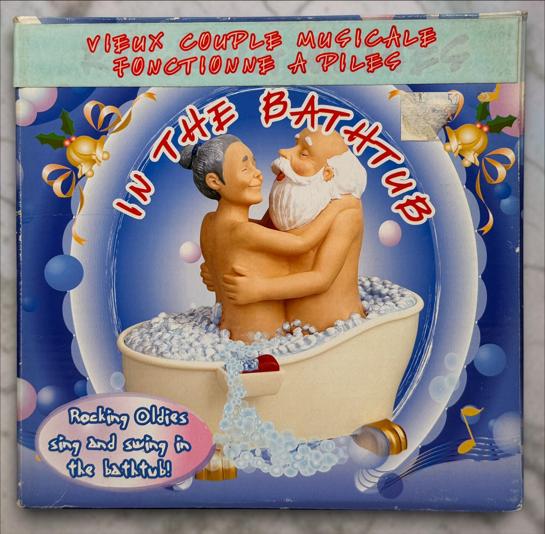 Vintage Rocking Oldies sound-activated musical bathtub couple figurine with animated movement and original box. Works fine and sold as-is.