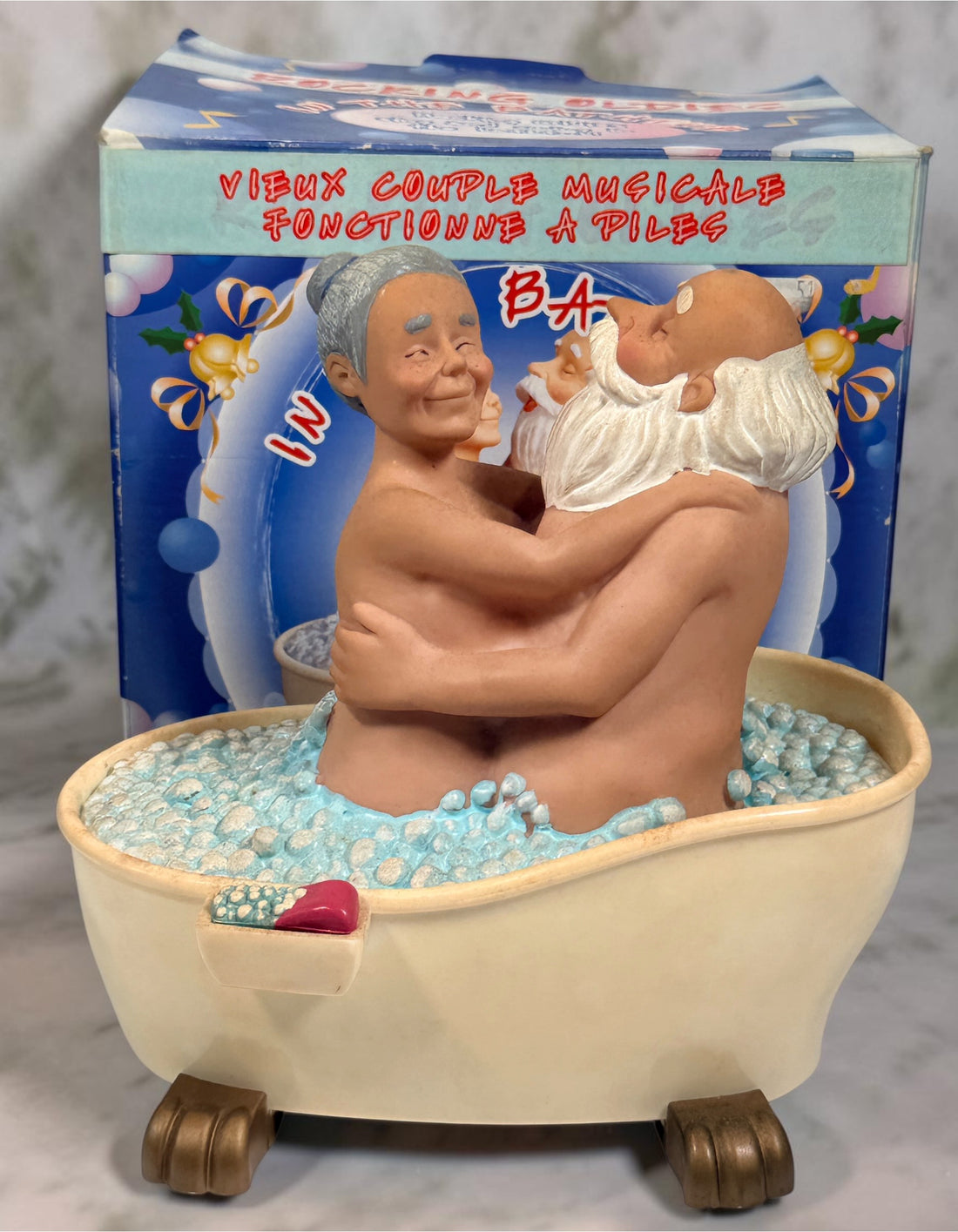 Vintage Rocking Oldies sound-activated musical bathtub couple figurine with animated movement and original box. Works fine and sold as-is.