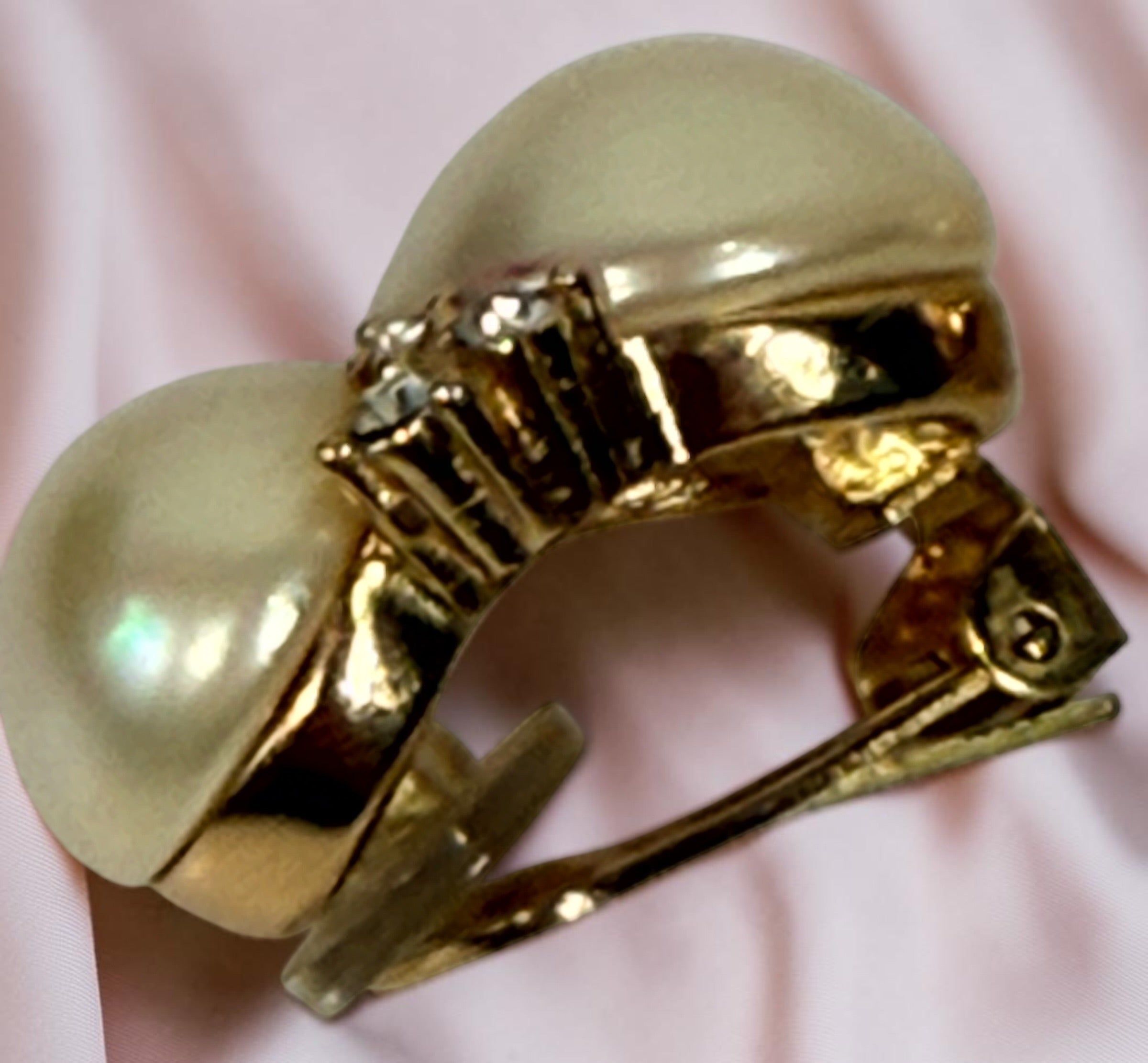 Signed vintage Christian Dior clip earrings with double simulated pearls, clear crystals and gold-tone finish. Elegant collectible designer jewelry.