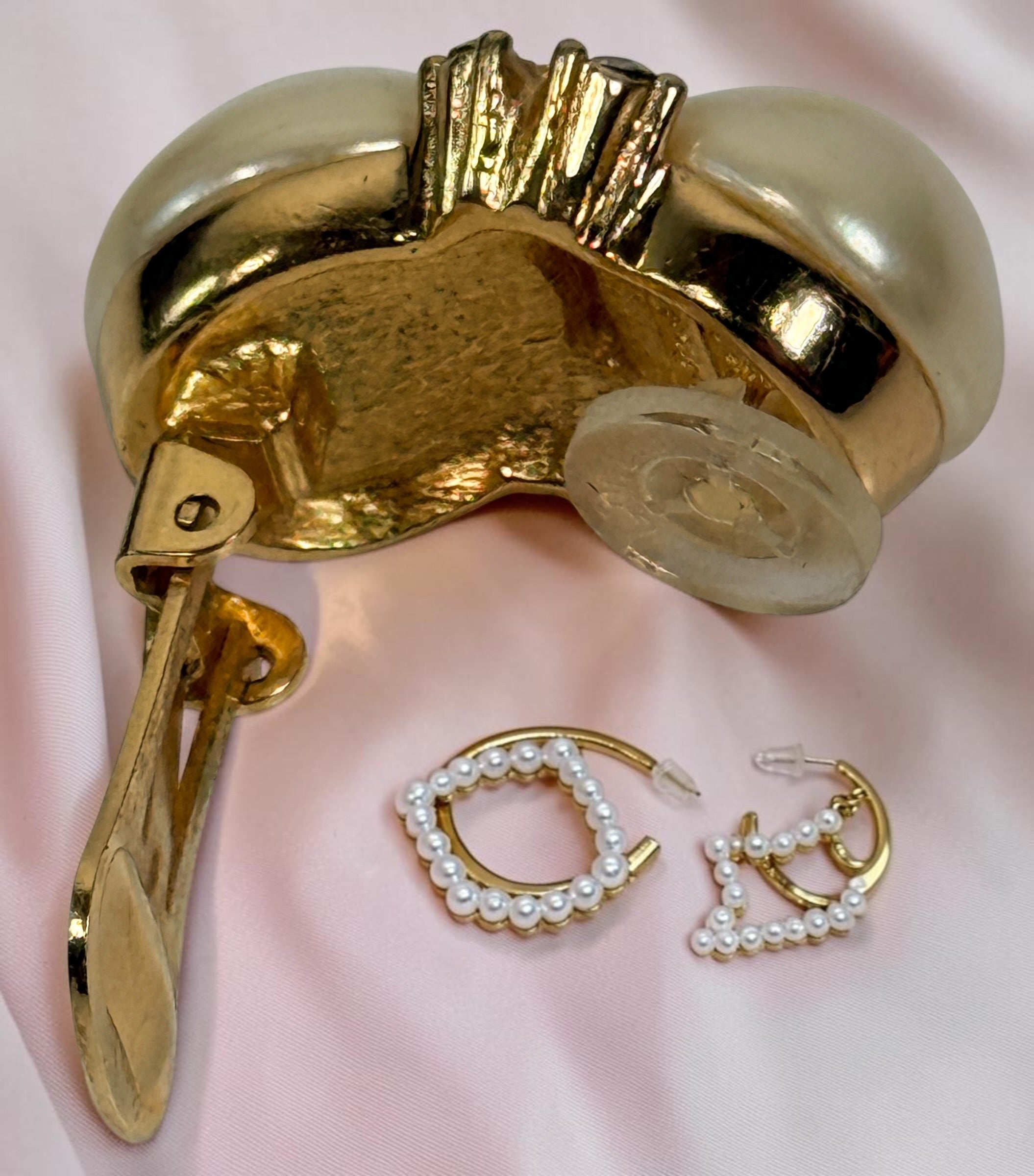 Signed vintage Christian Dior clip earrings with double simulated pearls, clear crystals and gold-tone finish. Elegant collectible designer jewelry.