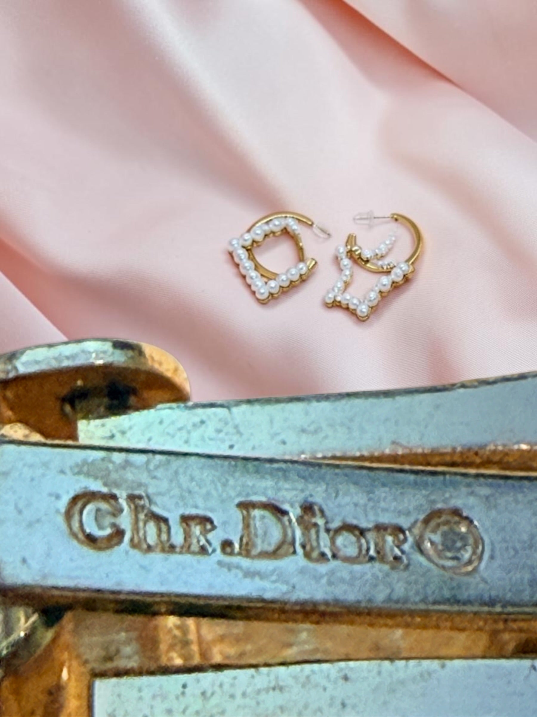 Signed vintage Christian Dior clip earrings with double simulated pearls, clear crystals and gold-tone finish. Elegant collectible designer jewelry.