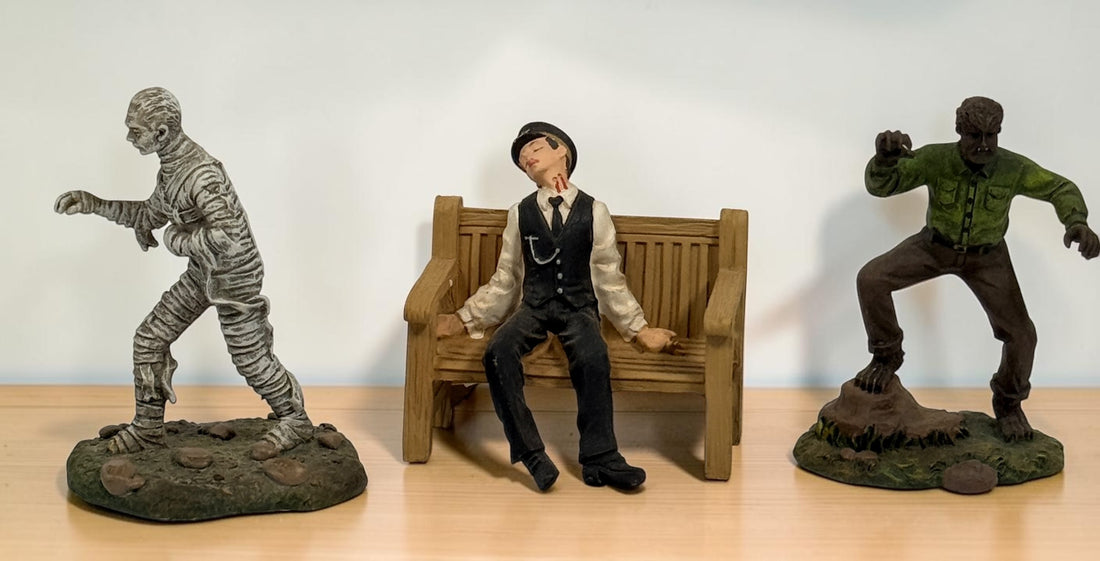 Retired Hawthorne Village horror figurine lot with Wolf Man, Mummy, Conductor, Franklin and Dawn of the Dead Helicopter Zombie.