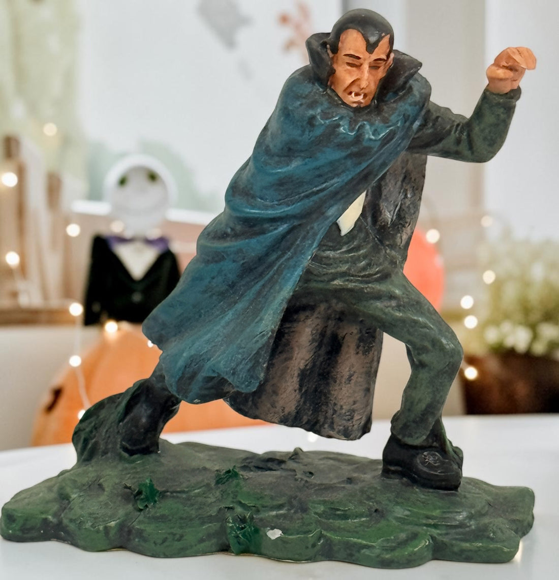 Lot of three retired Hawthorne Village Dracula and Munsters resin figurines, including Grandpa Getting Comfy. Vintage Universal Monsters decor