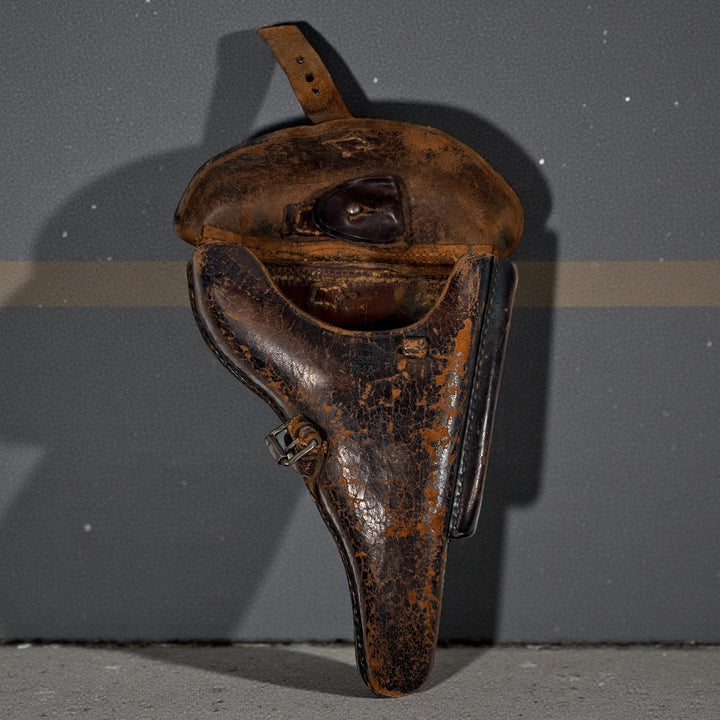 WWII German P08 Luger leather holster with Waffenamt mark, original wartime military issue, worn but intact, collectible display piece.