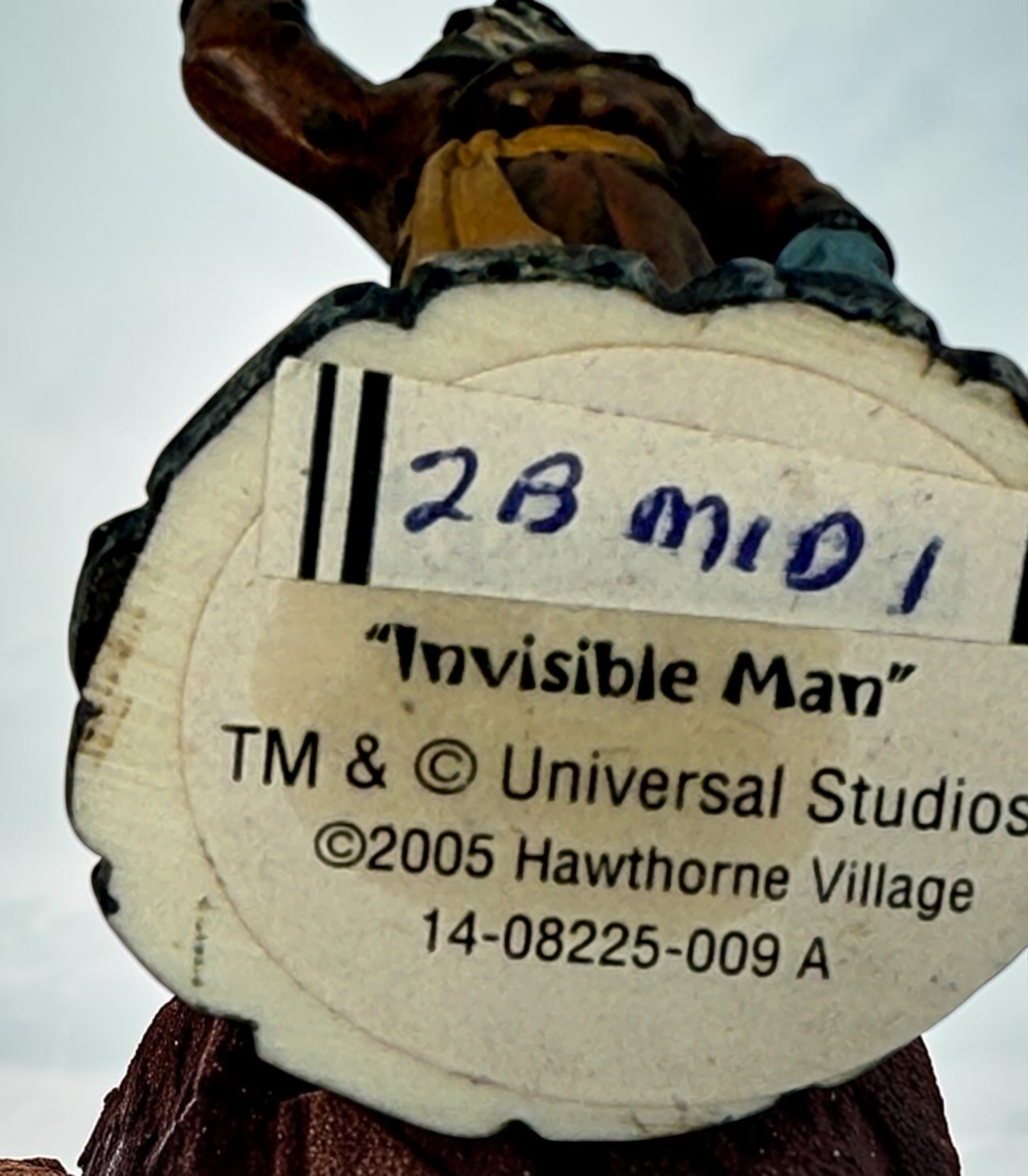 2005 Hawthorne Village Invisible Man figurine from the Universal Studios Monsters collection, featuring its original transparent-hand effect.