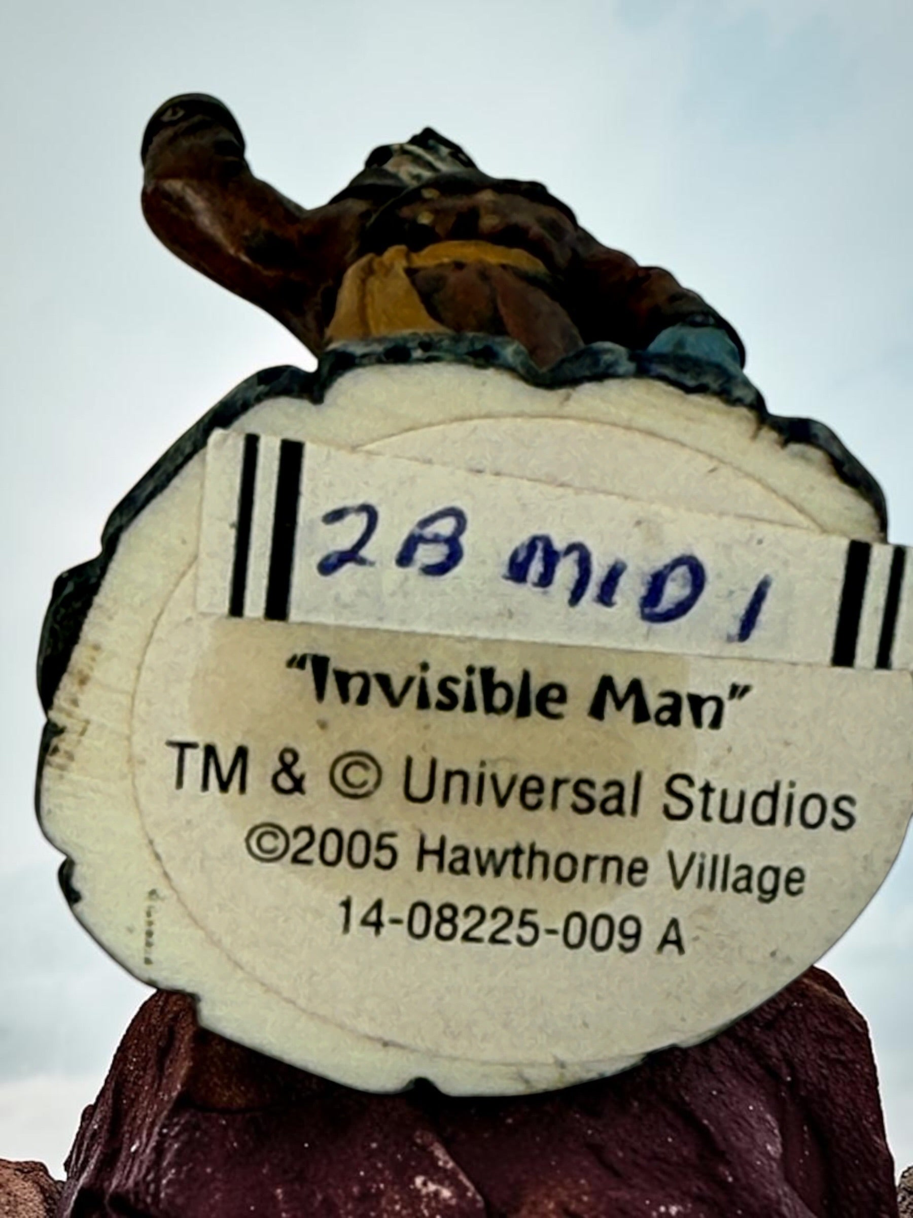 2005 Hawthorne Village Invisible Man figurine from the Universal Studios Monsters collection, featuring its original transparent-hand effect.