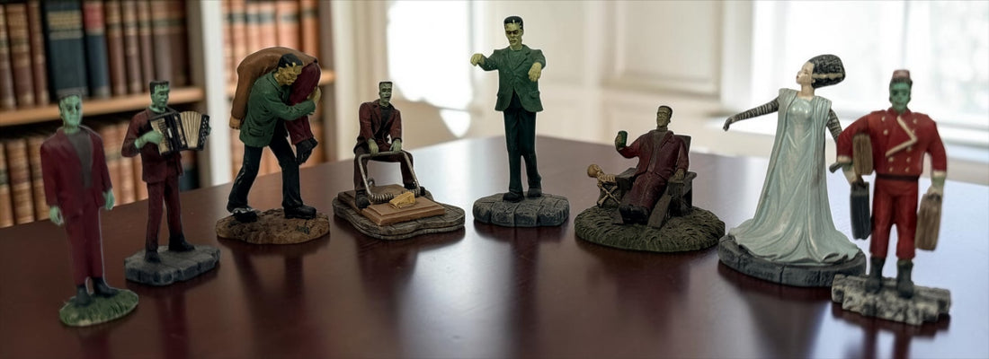 Lot of eight Hawthorne Village Munsters and Universal Monsters resin figurines, including Herman, Bell Hop and Bride of Frankenstein.