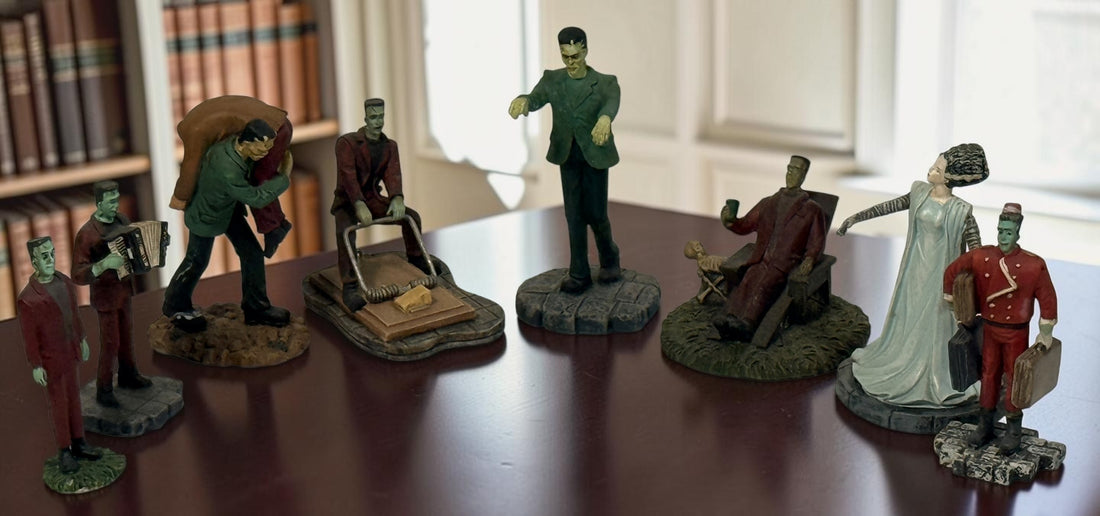 Lot of eight Hawthorne Village Munsters and Universal Monsters resin figurines, including Herman, Bell Hop and Bride of Frankenstein.