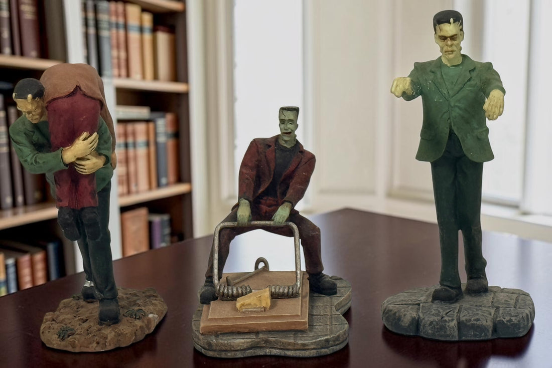 Lot of eight Hawthorne Village Munsters and Universal Monsters resin figurines, including Herman, Bell Hop and Bride of Frankenstein.