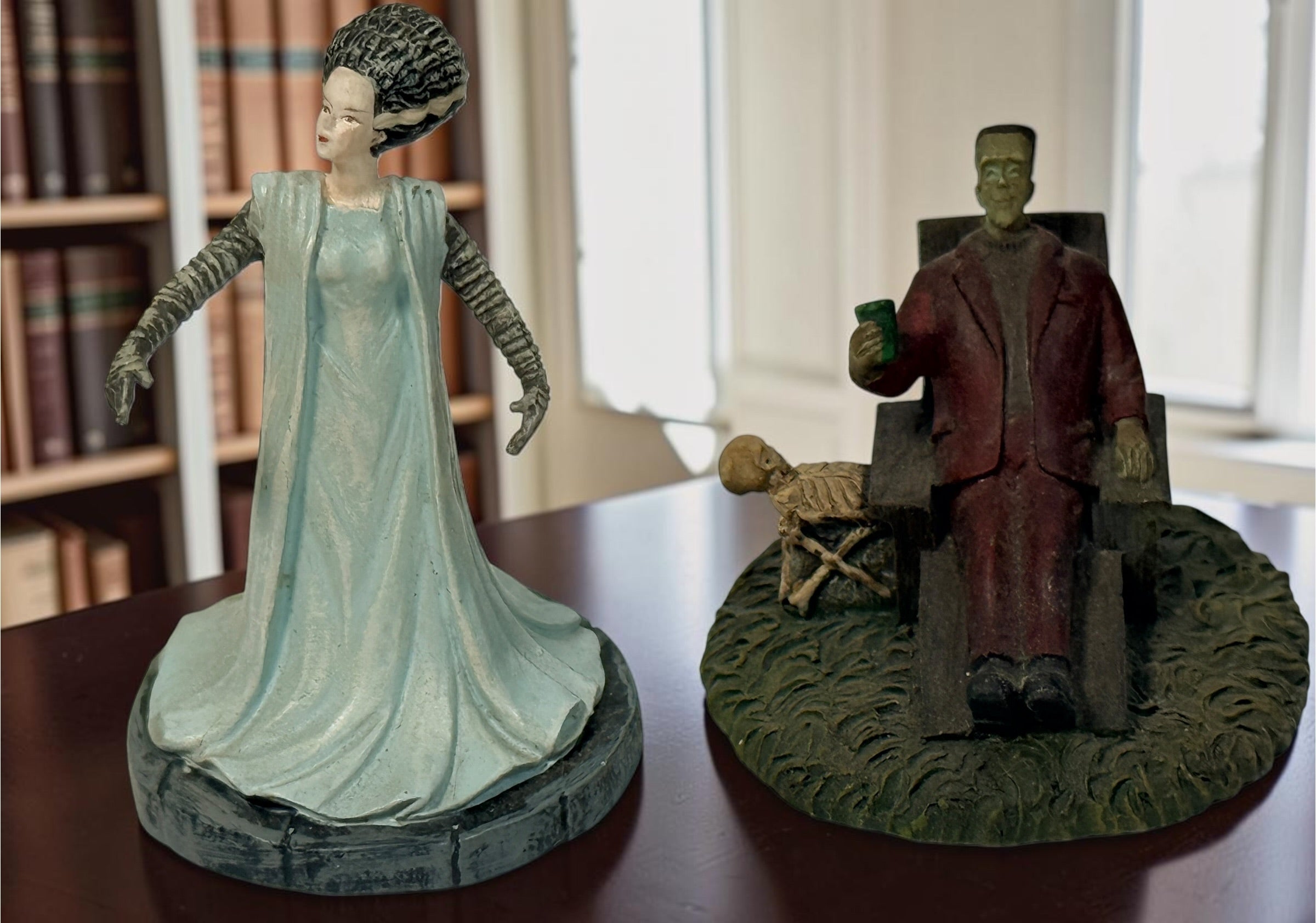 Lot of eight Hawthorne Village Munsters and Universal Monsters resin figurines, including Herman, Bell Hop and Bride of Frankenstein.