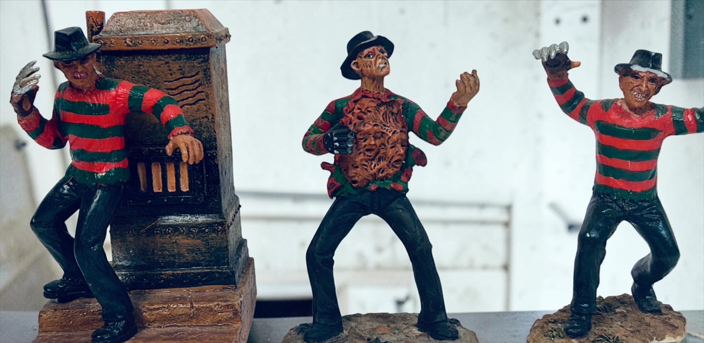 2007 Hawthorne Village Freddy Krueger set of 3 horror figurines from A Nightmare on Elm Street, officially licensed by New Line Productions.